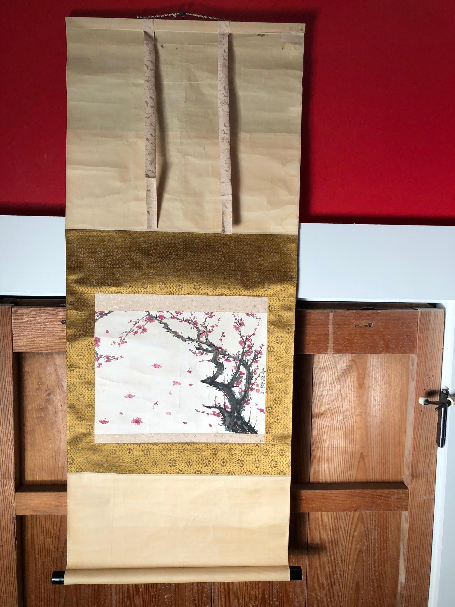 A beautiful and compelling Japanese antique hand-painted scroll of the Ume plum tree dating to the 19th century and worthy of your favorite room.
Hand painting on paper in simple soft pleasing colors, signed.

Inscription:
Signed Ruksyu
Wood