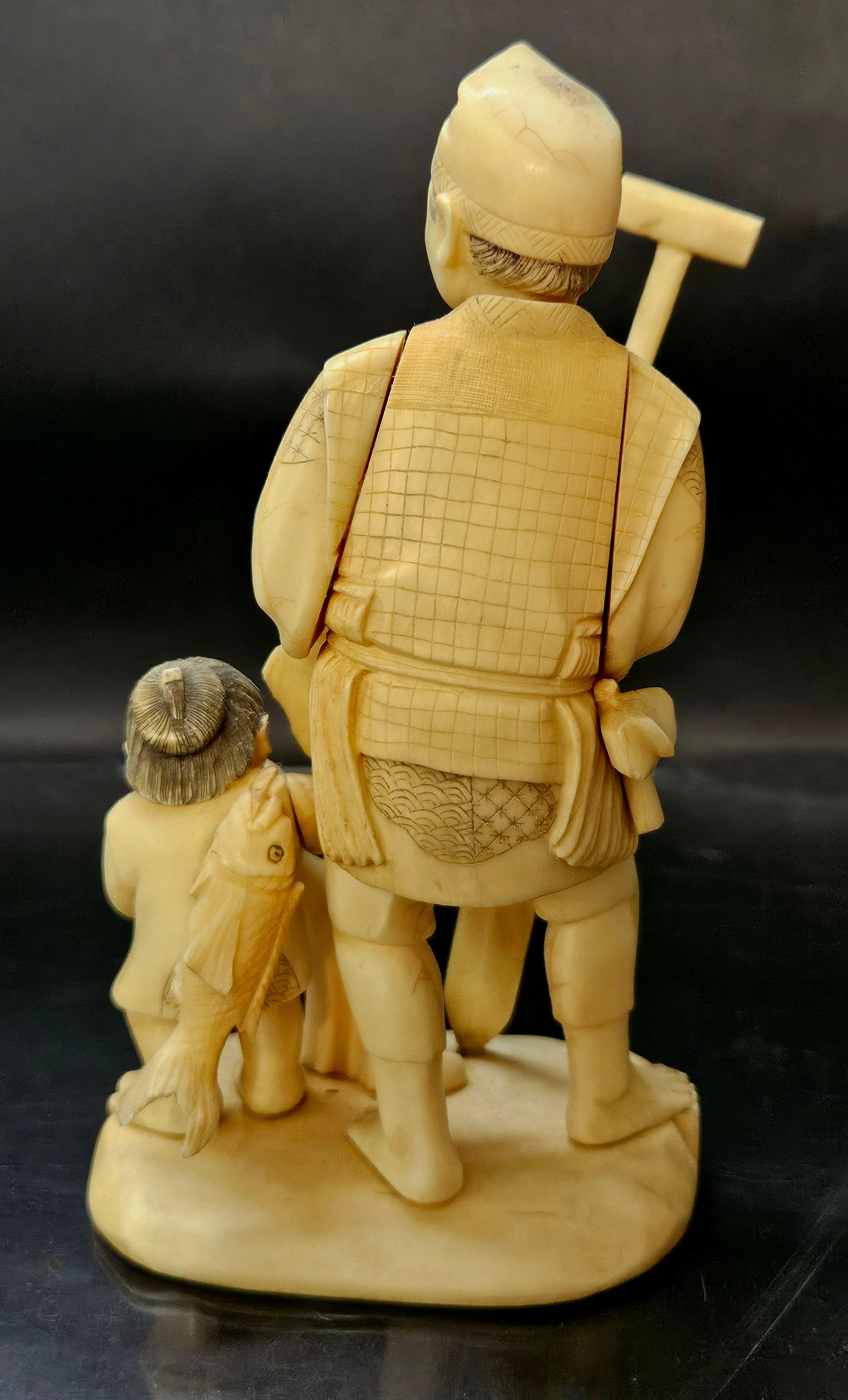 Japan Carved Okimono Group Of A Fisherman and His Kid, 1890 Meiji, Signed For Sale 3