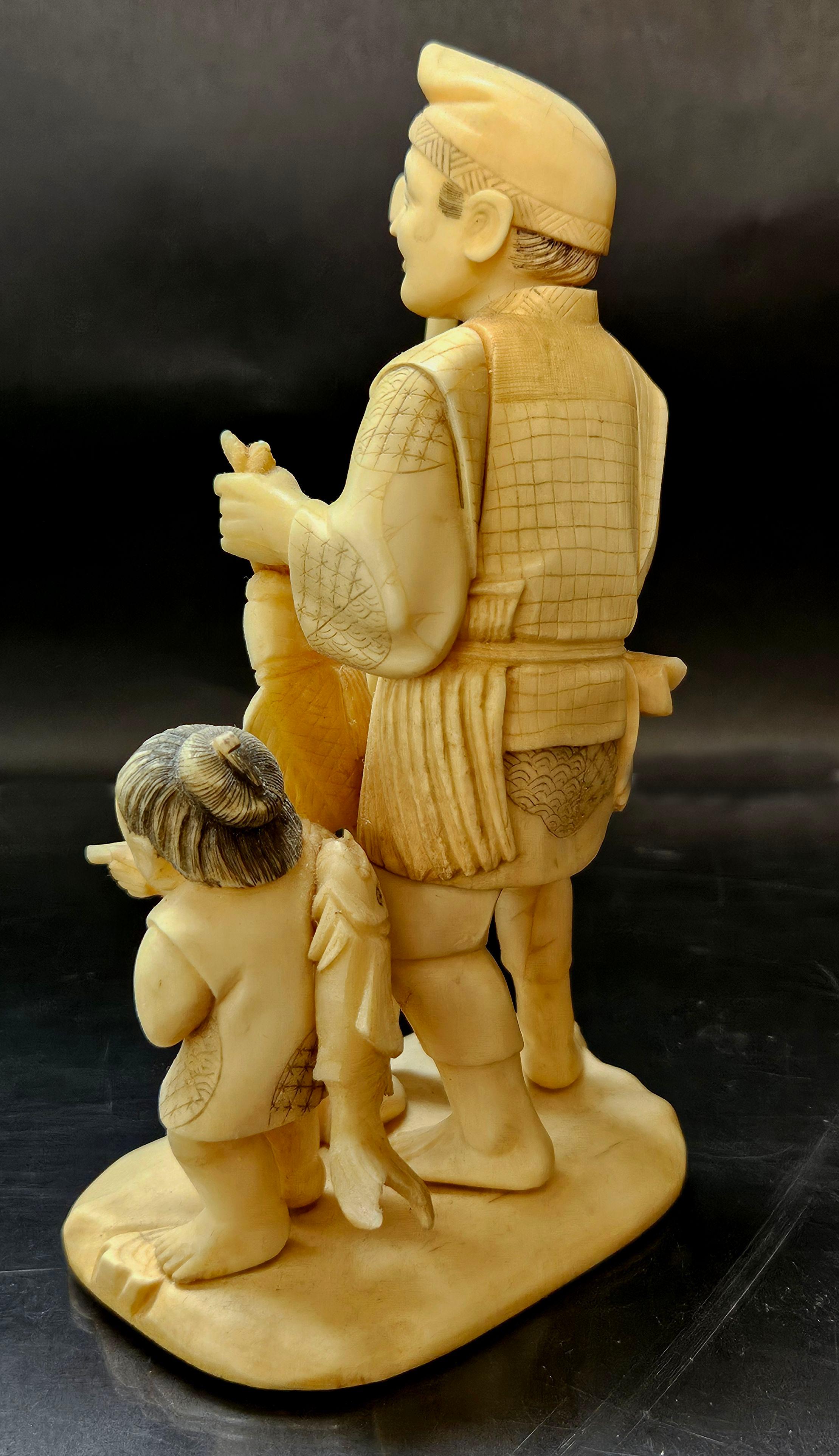 Japan Carved Okimono Group Of A Fisherman and His Kid, 1890 Meiji, Signed For Sale 4