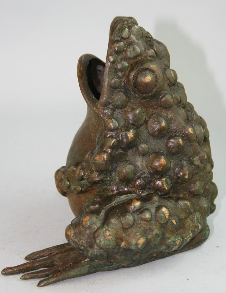 1233 Hand cast in a lost wax process bronze frog with a dark varigated patina and fine details.