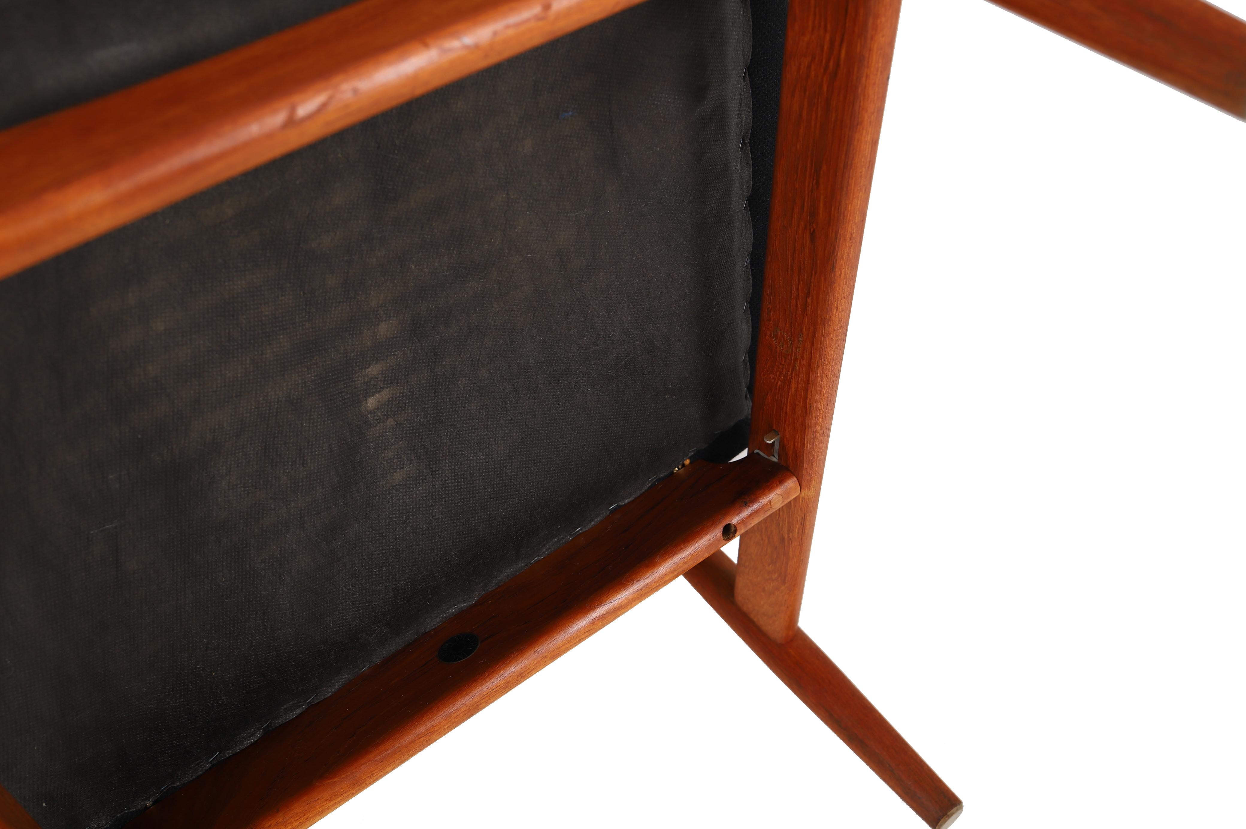 The Japan chair by Finn Juhl, made by France & Dvorkesen.  Upholstered in a soft black Tonus wool by Kvadrat.  Old growth teak finished in oil, exposed brass hardware detailing. 


Professional, skilled furniture restoration is an integral part of