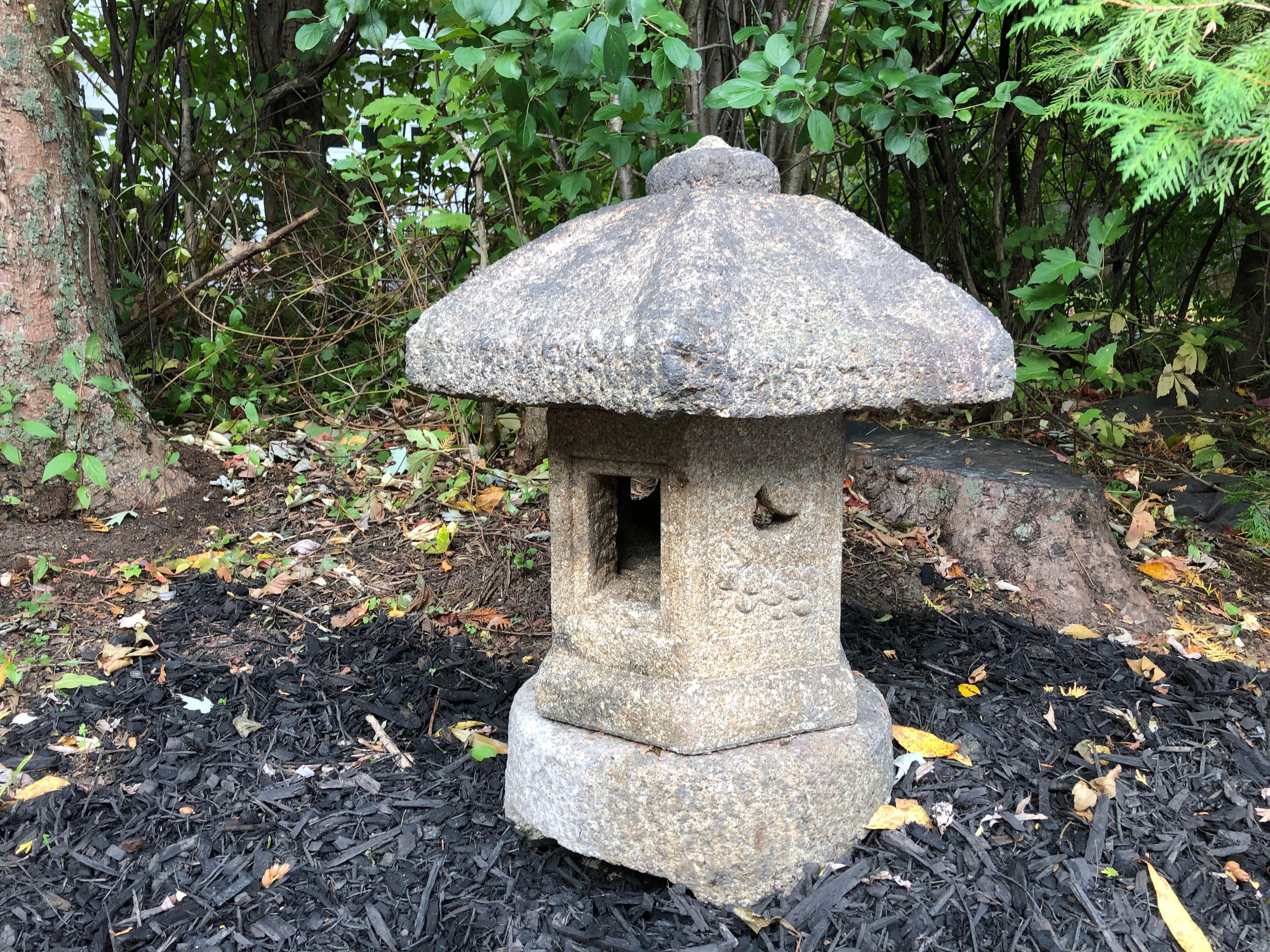 Found on our last trip to Japan.

An Antique Okigata (portable) three piece stone lantern with thick and heavy dark patina from great age. The firebox engraved with fine designs of birds, a tiger, and mountainside symbols. 

Dimensions: 30 inches