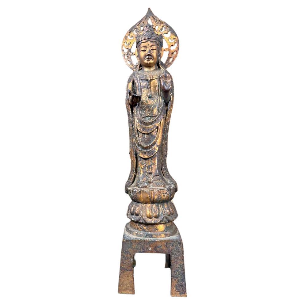 Magnifique visage de Kanon Guanyin en bronze ancien signé Shohei en vente