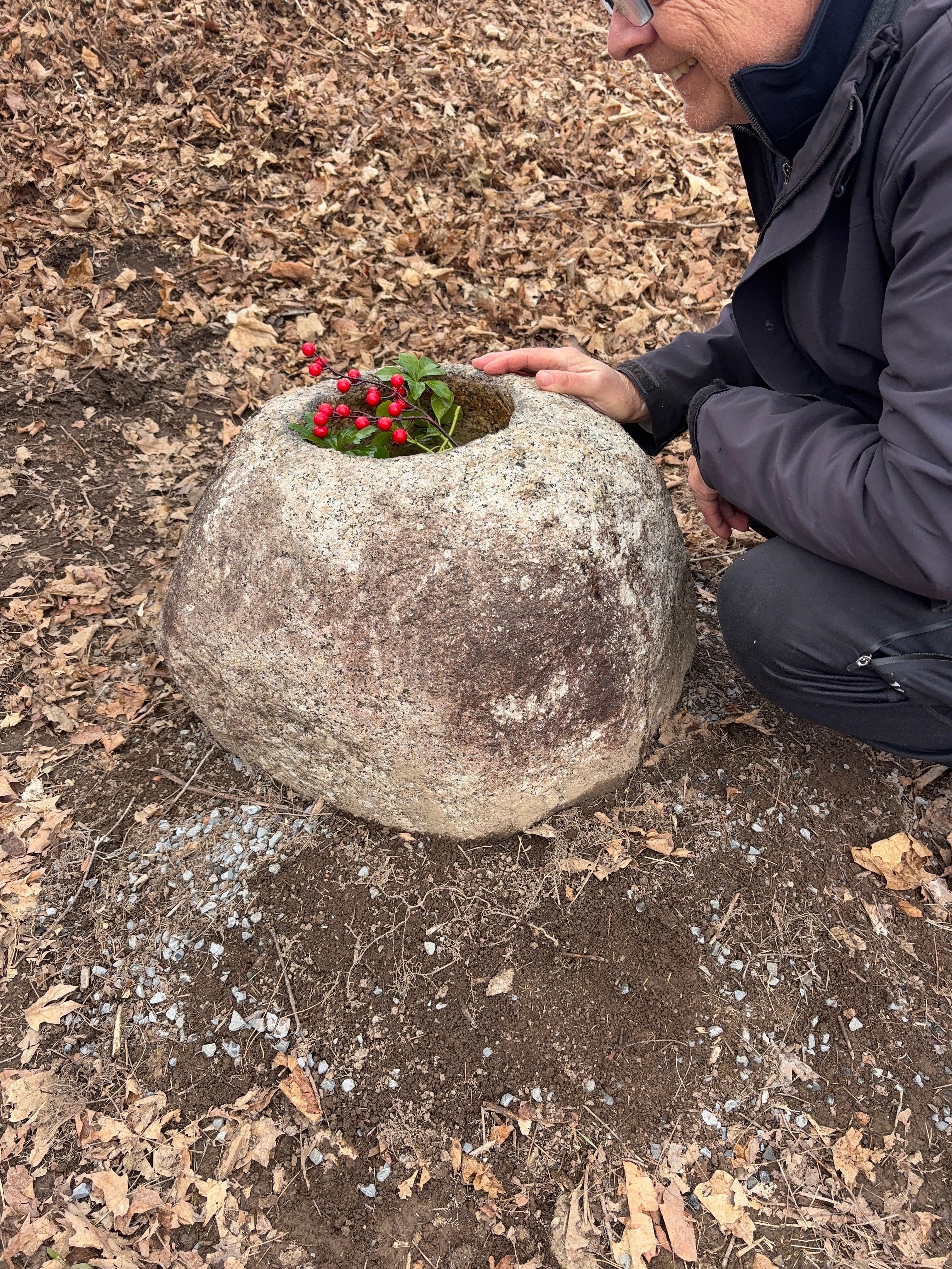 Japan, a handsome and large  natural organic shaped stone water basin planter -tsukubai- created from a natural granite mountain boulder and sourced from a decades old garden. This is a unique and visually attractive garden planter or water basin