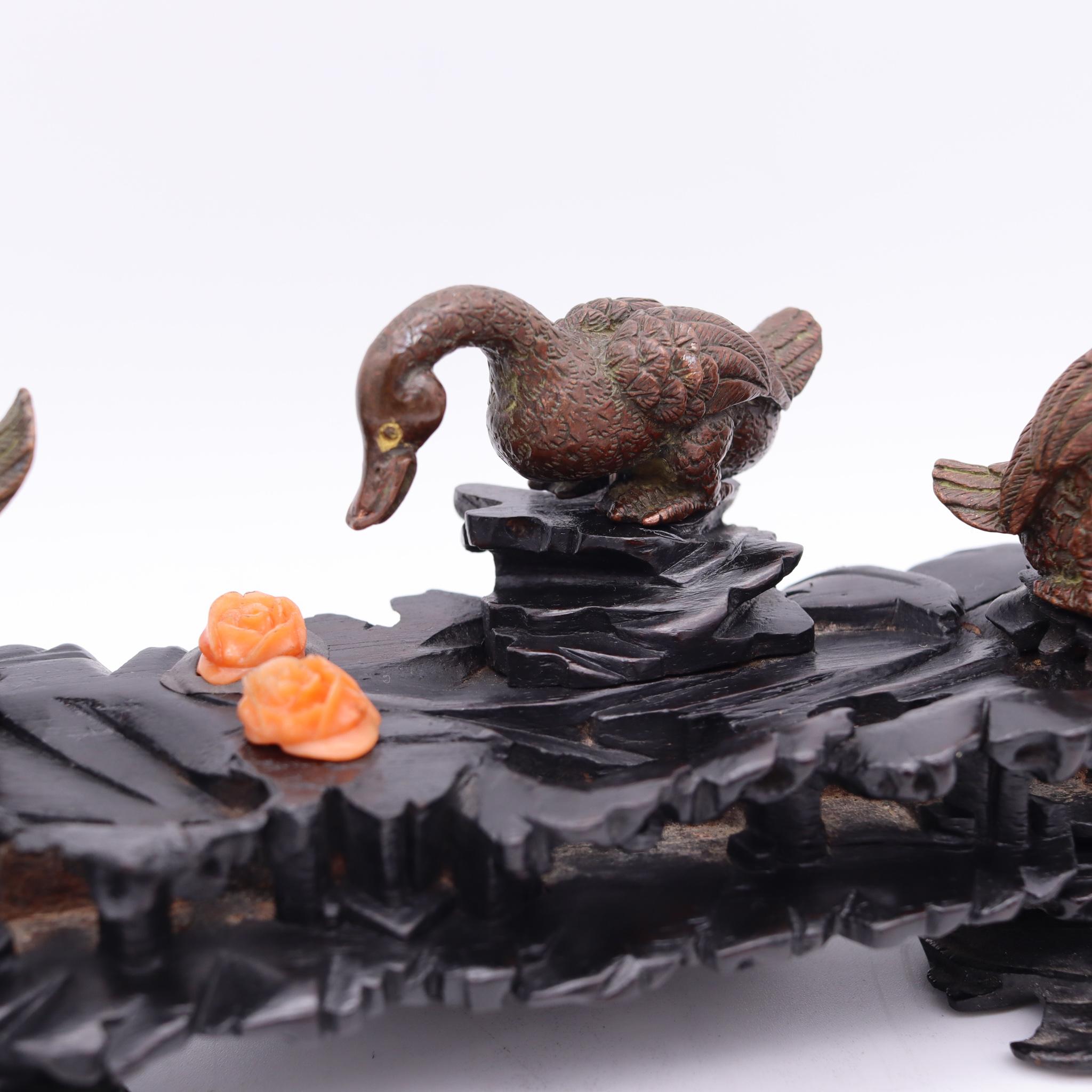 Hand-Crafted Japan Meiji 1900 Three Bronze Ducks Sculpture in Wood Stand and Coral For Sale