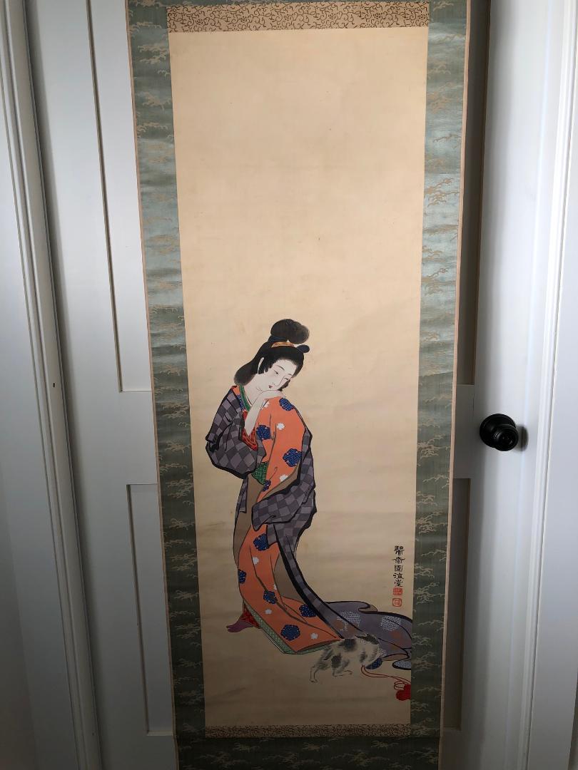 japanese woman cutting kimono cat