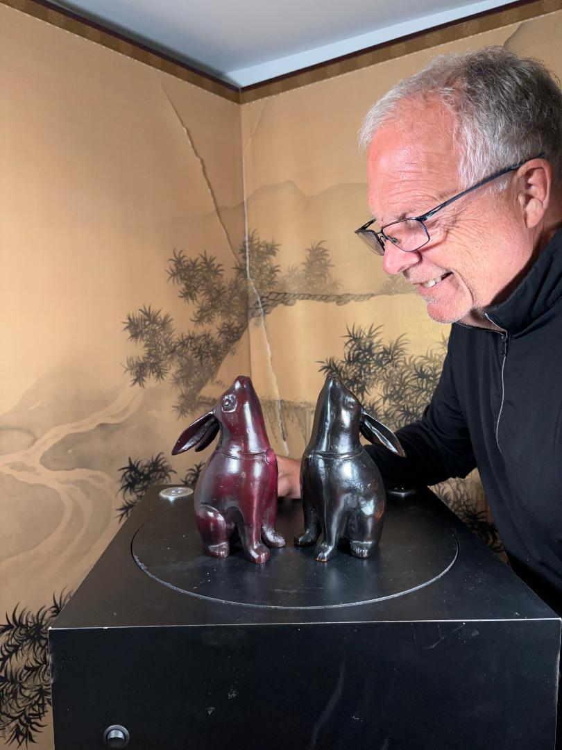 Here's a beautiful and unique way to accent your indoor gallery or private collection space with this very unusual pair of treasures from Japan! 

This is a hard to find red and ebony finely cast effigy pair (2)
of tall 