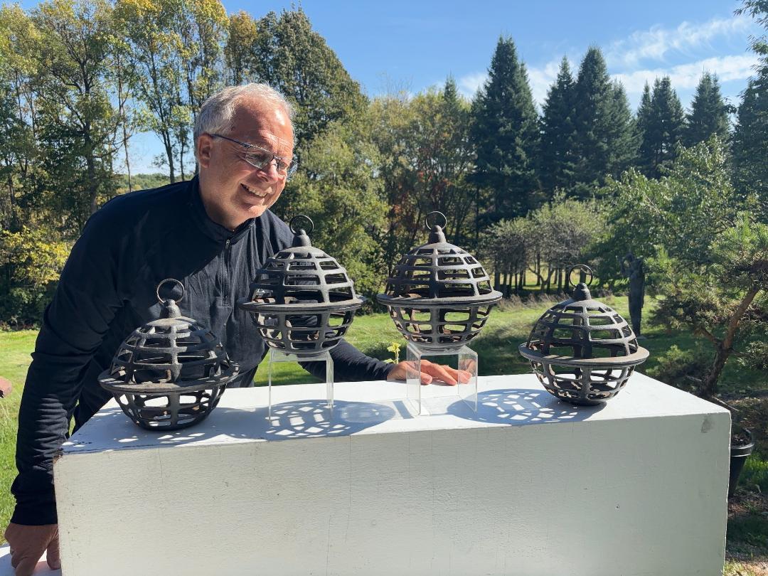 Unusual Opportunity

First set of four (4) matching modernist round orb lanterns we have encountered. 

Japan, a set of hand cast round lanterns coming from a New England garden,  Taisho period. 

May be suspended from their sturdy top bronze loop