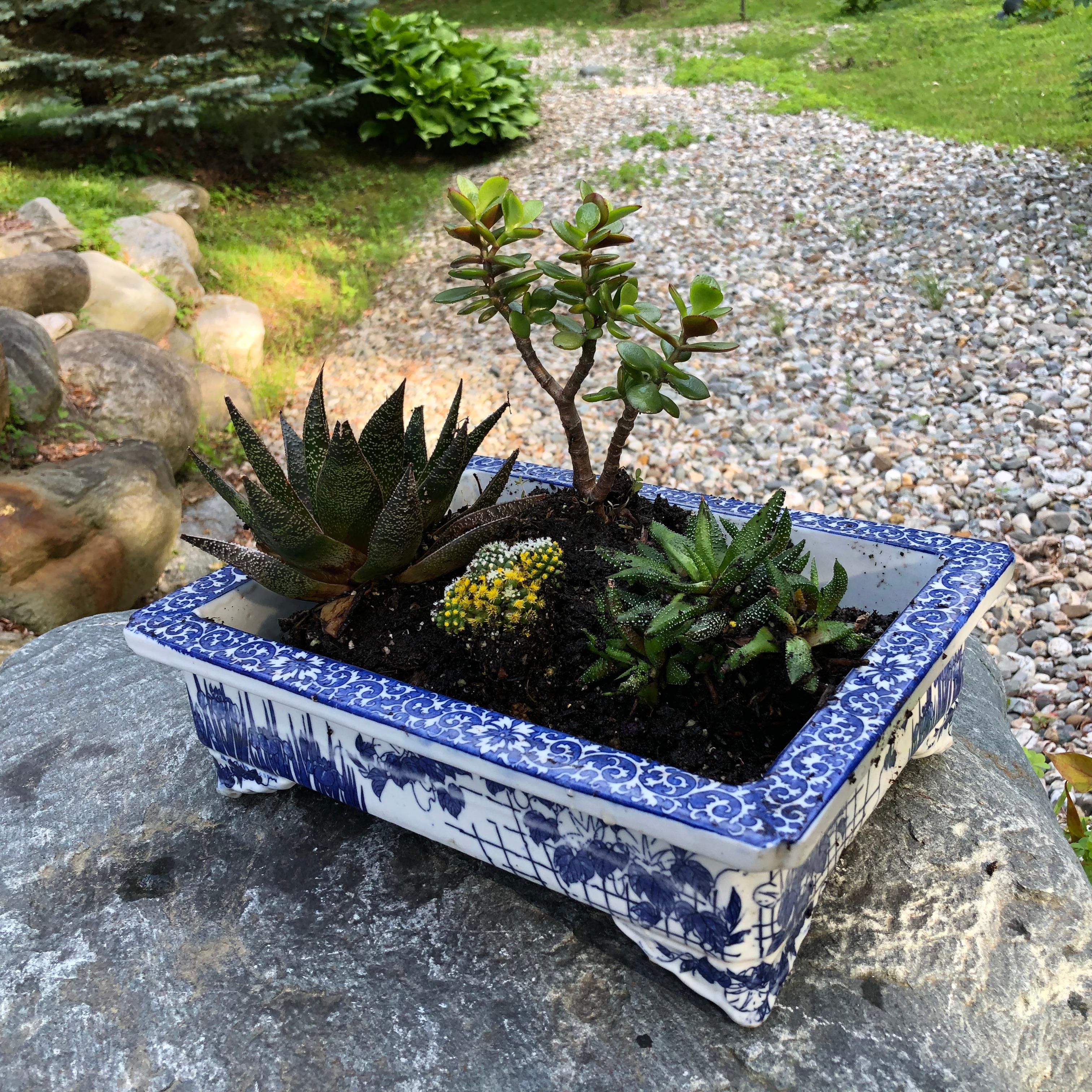 Here's a beautiful and unique way to accent your indoor gallery or private collection space with this very unusual treasure from Japan! 

This is a hard to find blue and white painted ceramic rectangular planter for ikebana, flowers, or bonsai. It