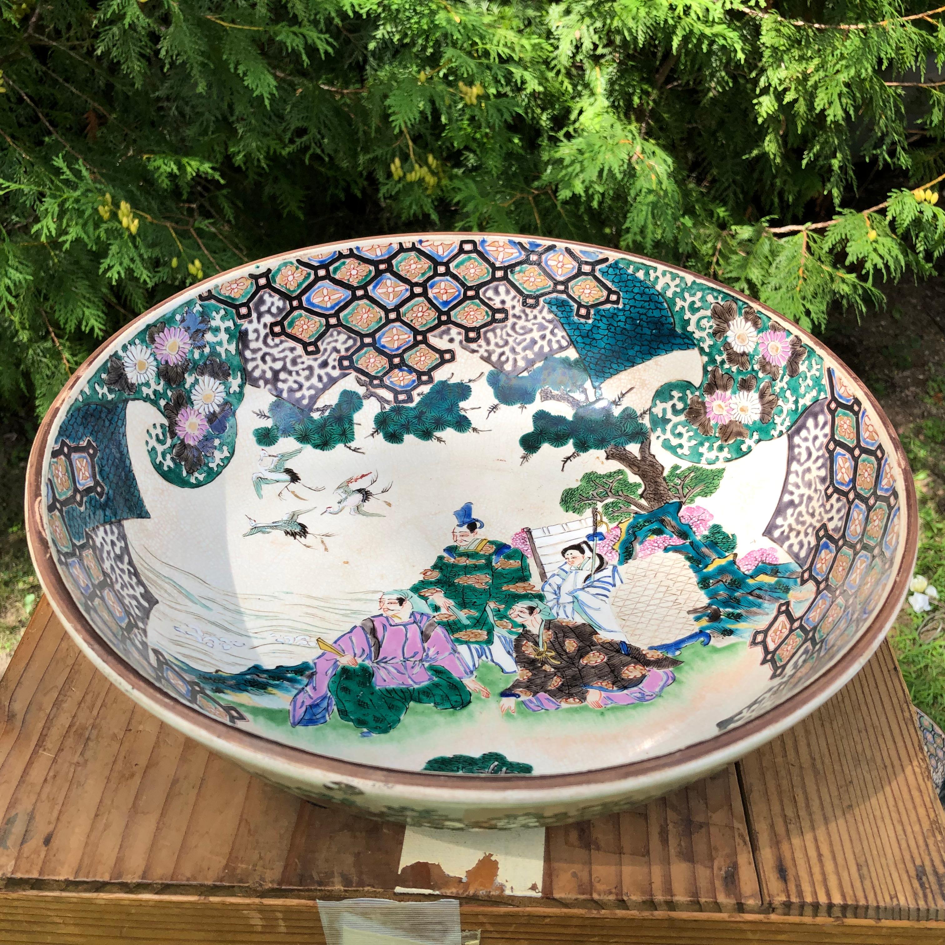 From our recent Japanese Acquisition Travels- matching set three (3)  three gorgeous hand painted bowls from Japan in their original tomobako box.

Japan hard to find early set of three (3) brilliantly hand painted ceramic lush 