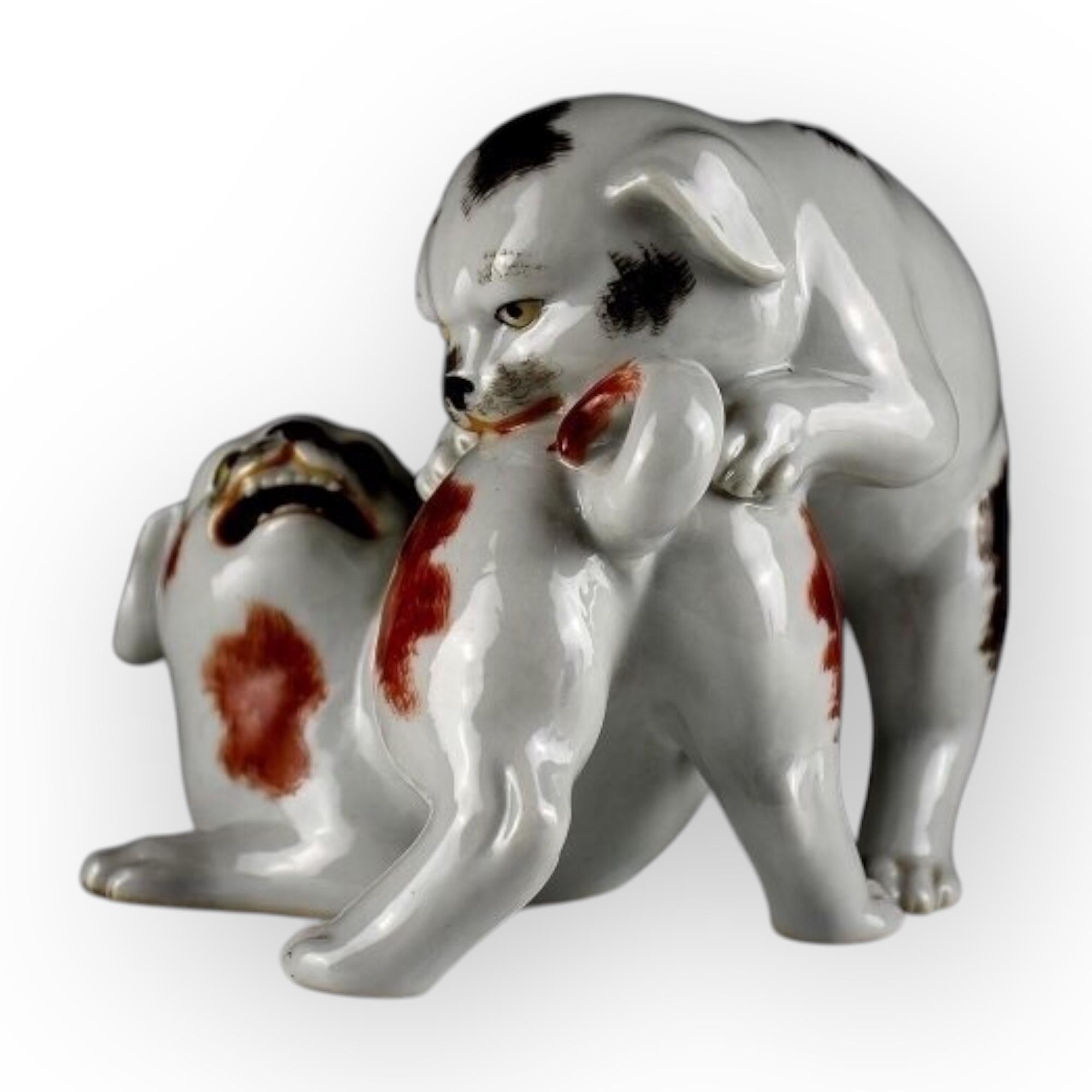 Japan, two small dogs, Kutani porcelain, circa 1900-1920

 A nice group of two charming playing puppies, Japanese porcelain from Kutani, hand painted enamel on a white background
Signed Toshusaku
14x18x15cm
 Meiji -Taisho period
