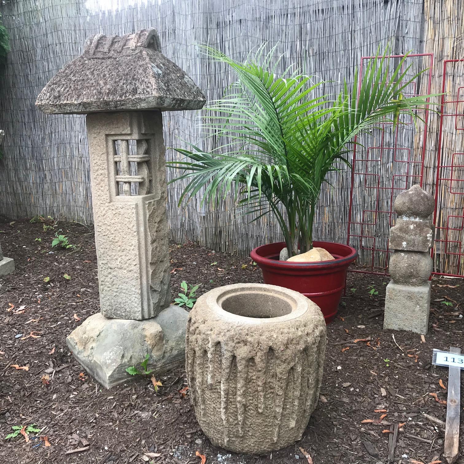 From our recent Japanese acquisitions travels.

Japan an unusual old “post” style hand-carved stone lantern with a unique Minka Mountain House roof and post form body- a rarely seen, unusual and unique combination, three sections. This is the first