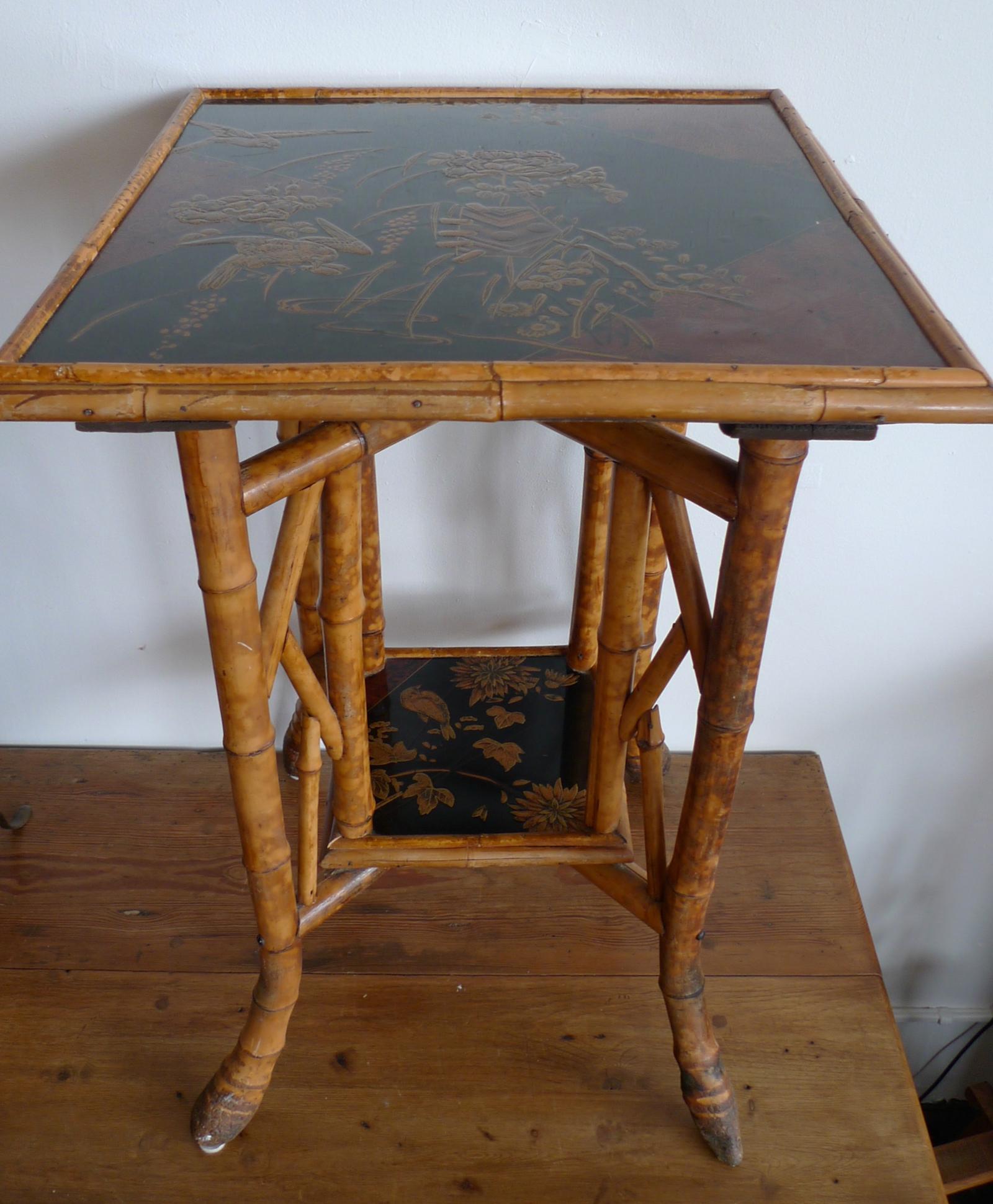 Japanese 1940s bamboo side table with painted inlay on both tabletop surfaces.