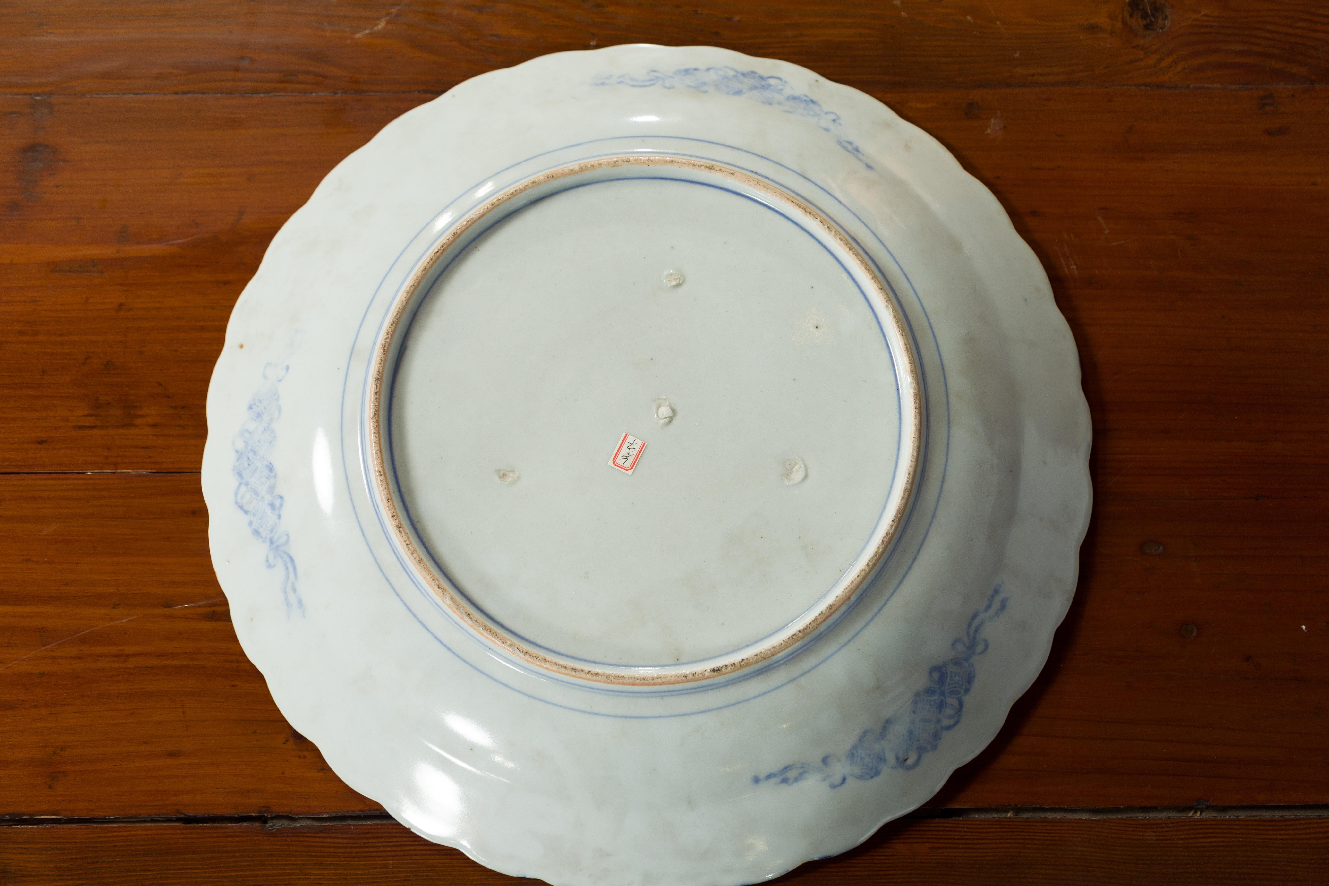 Japanese 19th Century Blue and White Porcelain Plate with Landscapes and Flowers For Sale 12