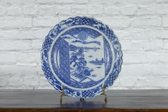 Japanese 19th Century Blue and White Porcelain Plate with Landscapes and Flowers