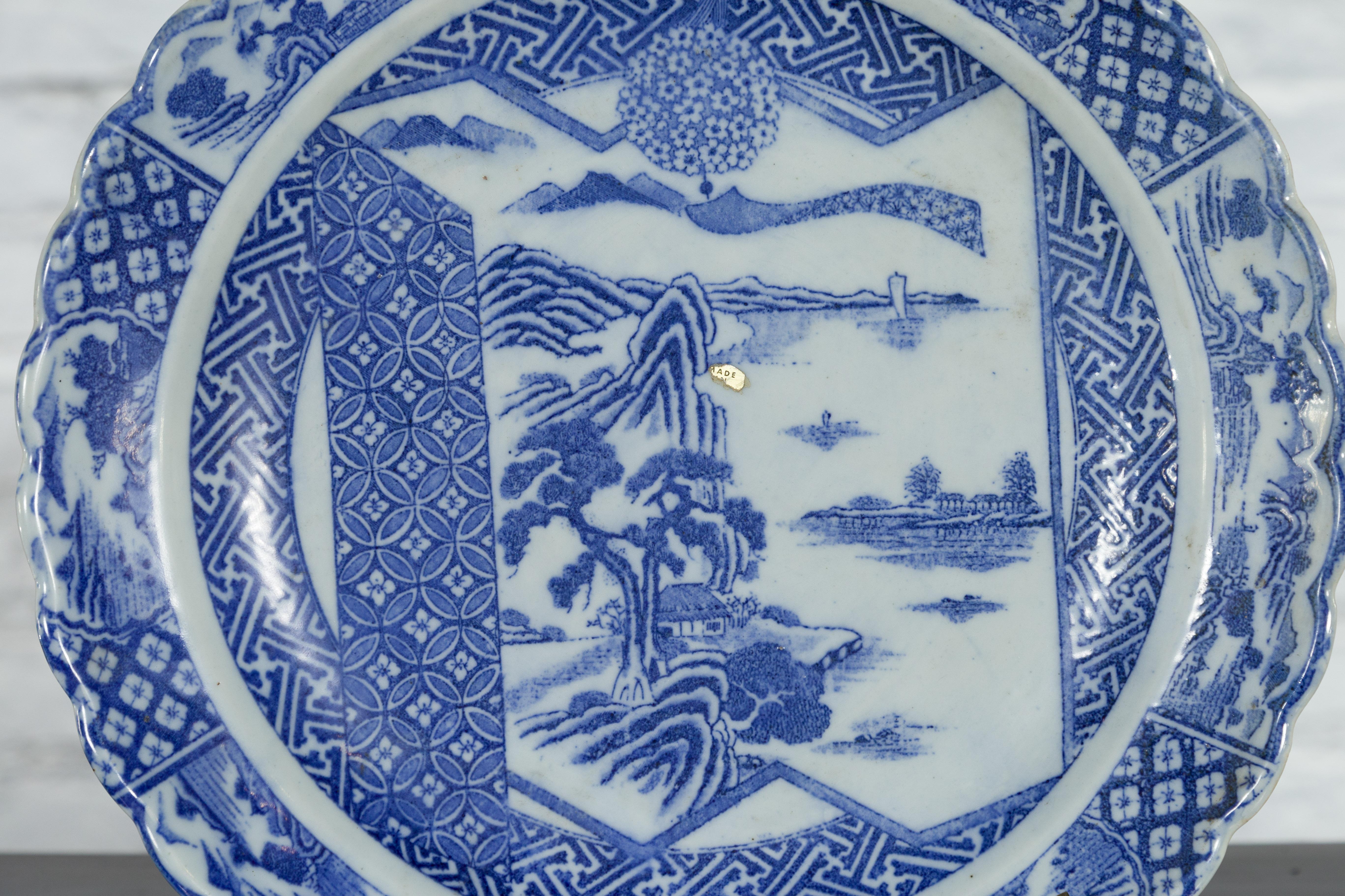 Japanese 19th Century Blue and White Porcelain Plate with Landscapes and Flowers For Sale 1