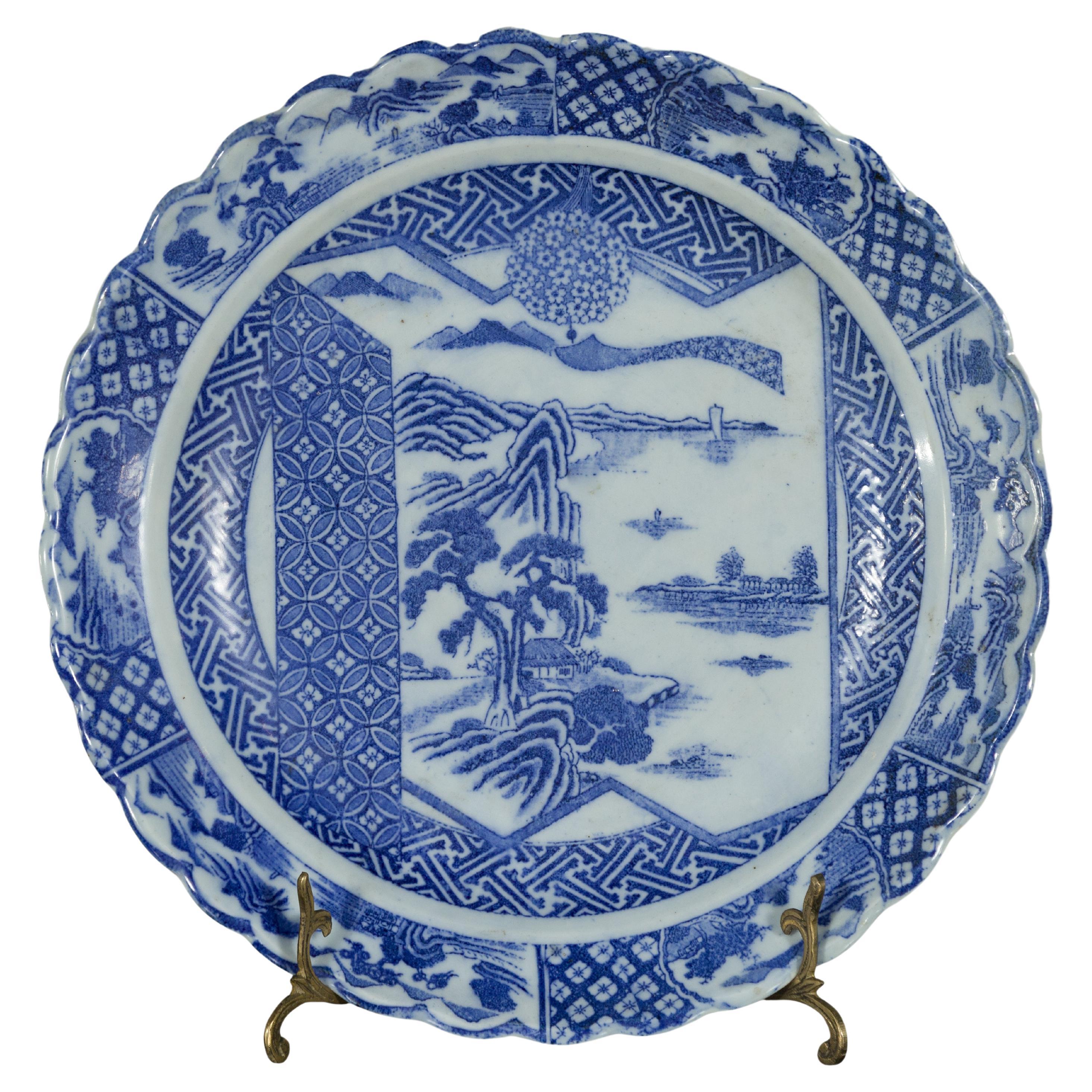 Japanese 19th Century Blue and White Porcelain Plate with Landscapes and Flowers For Sale