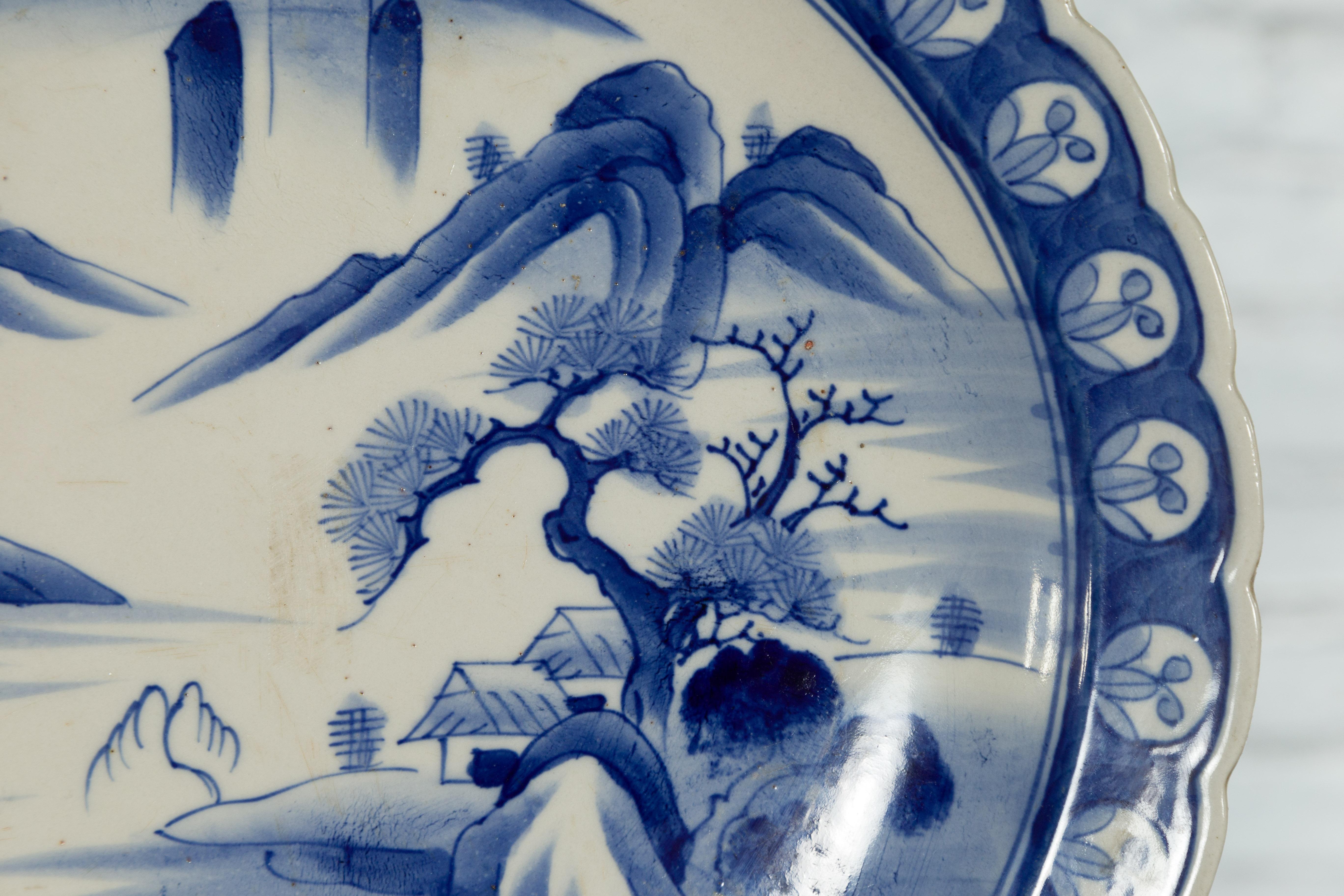 Japanese 19th Century Blue and White Porcelain Plate with Mountainous Landscape For Sale 8