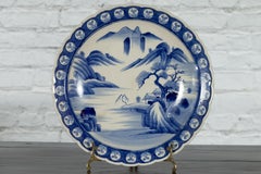 Japanese 19th Century Blue and White Porcelain Plate with Mountainous Landscape