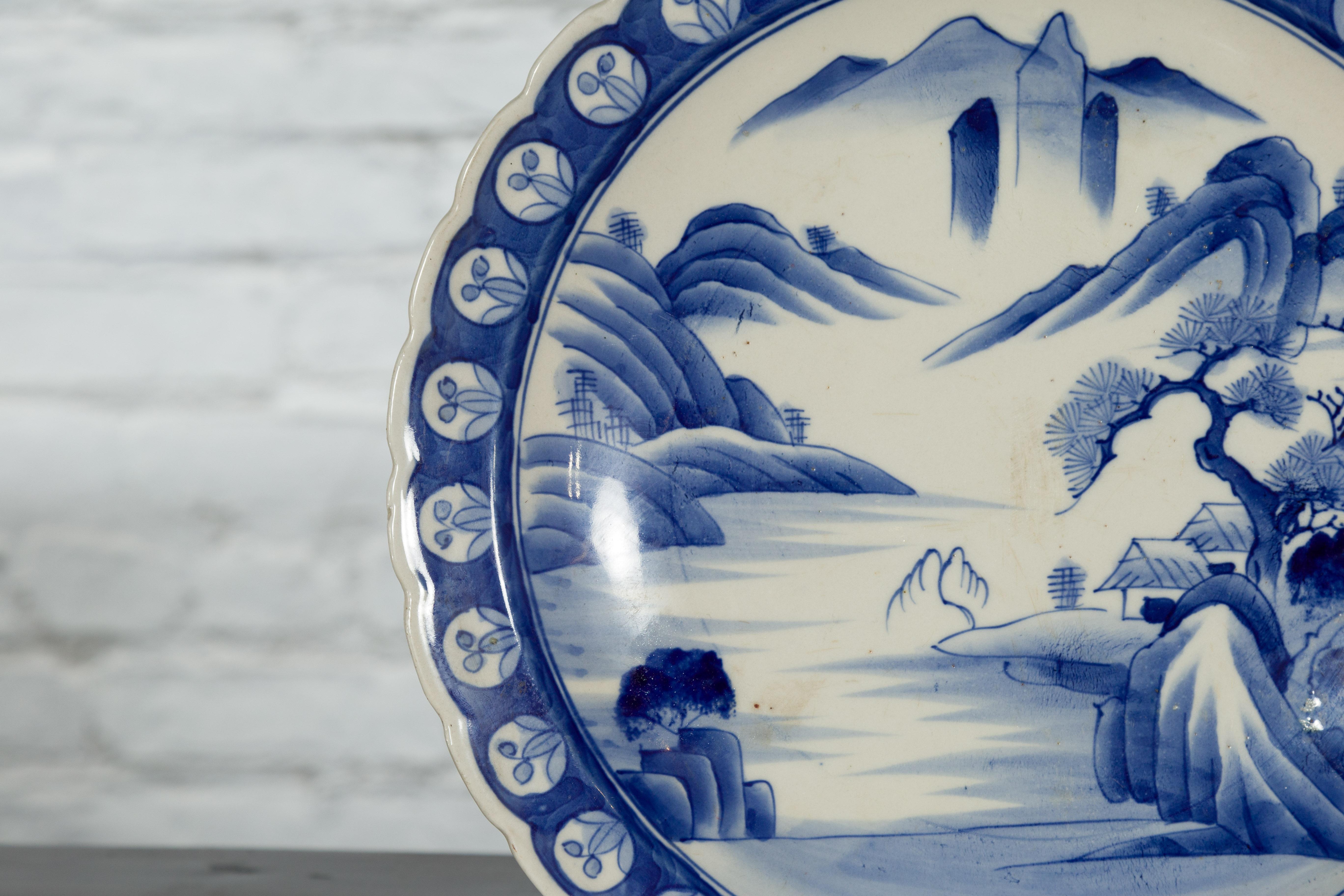 Japanese 19th Century Blue and White Porcelain Plate with Mountainous Landscape For Sale 3