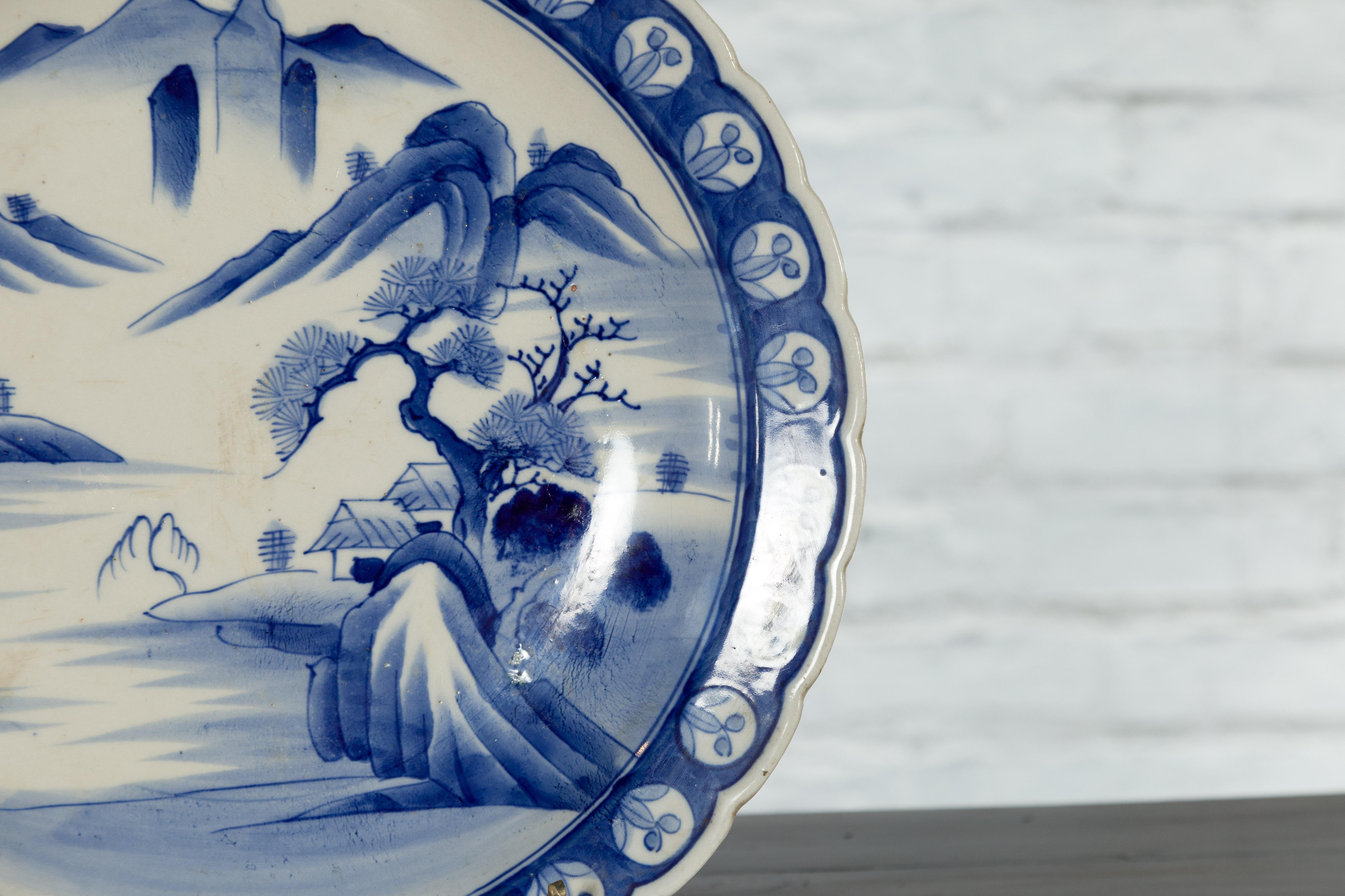 Japanese 19th Century Blue and White Porcelain Plate with Mountainous Landscape For Sale 3