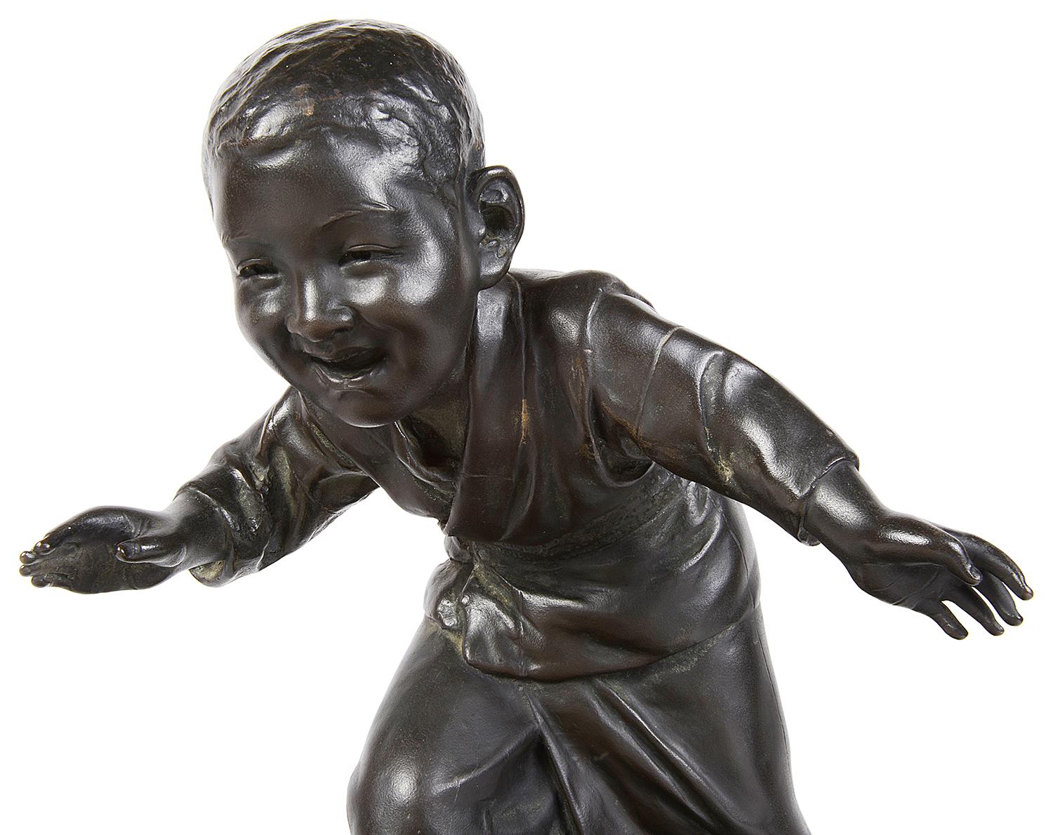 Japanese 19th Century Bronze Study of a Young Boy Chasing Geese For Sale 1