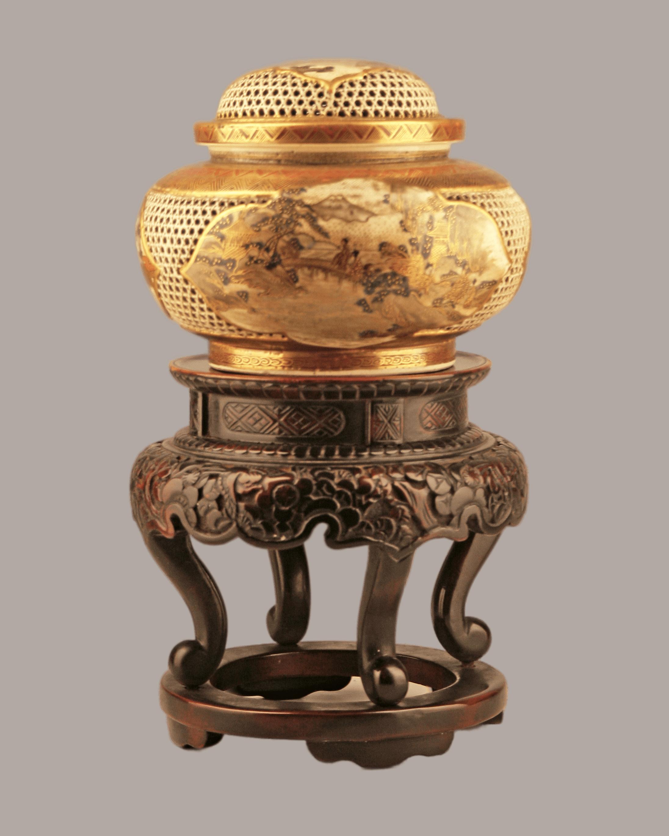 Japanese 19th century Edo-Meiji Period Satsuma stoneware incense burner (Koro) with small wooden support table

By: unknown
Material: ceramic, stoneware, wood, enamel, paint
Technique: carved, hand-carved, hand-painted, painted, varnished, enameled,