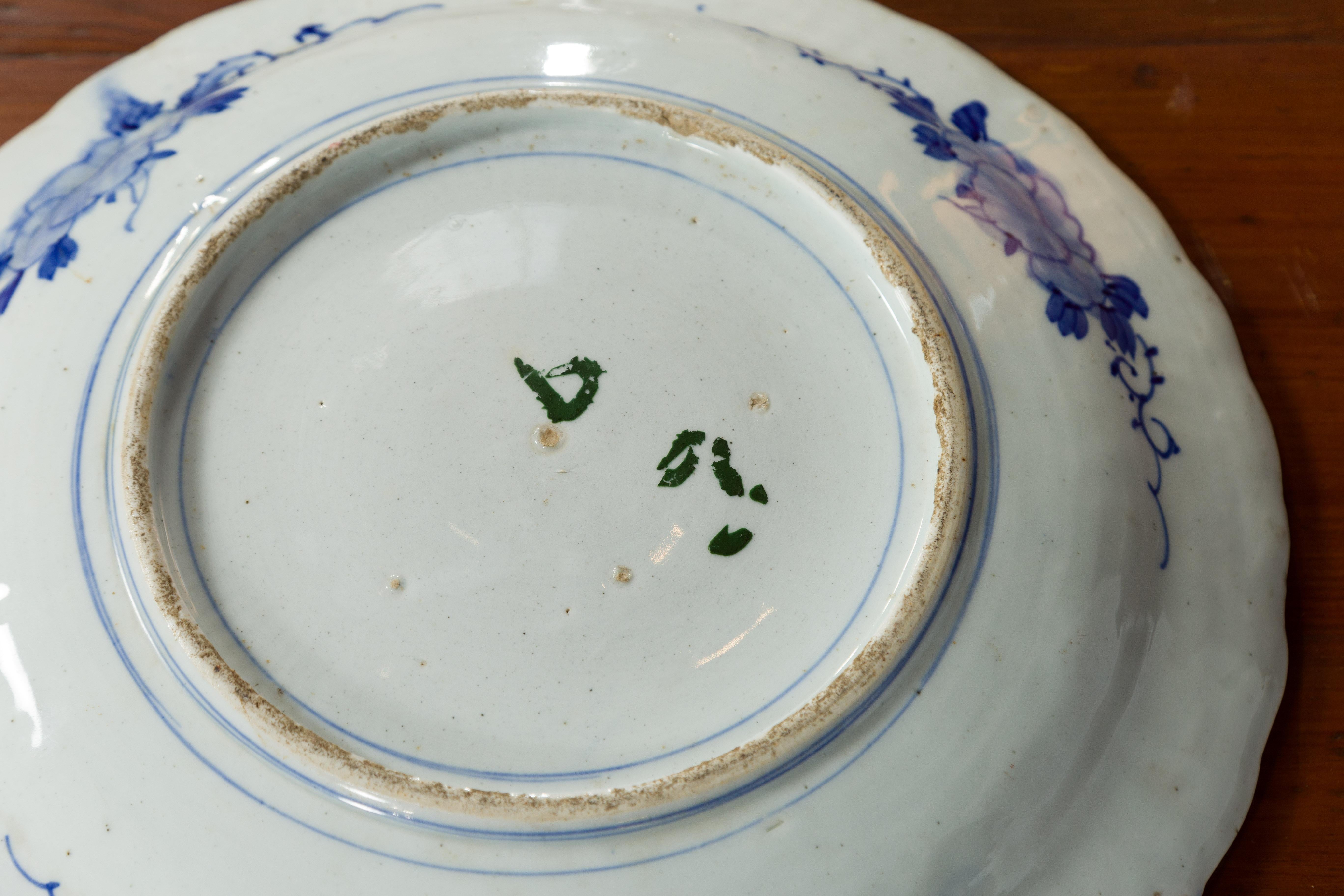 Assiette en porcelaine Imari japonaise du 19ème siècle avec décor peint en bleu et blanc en vente 8