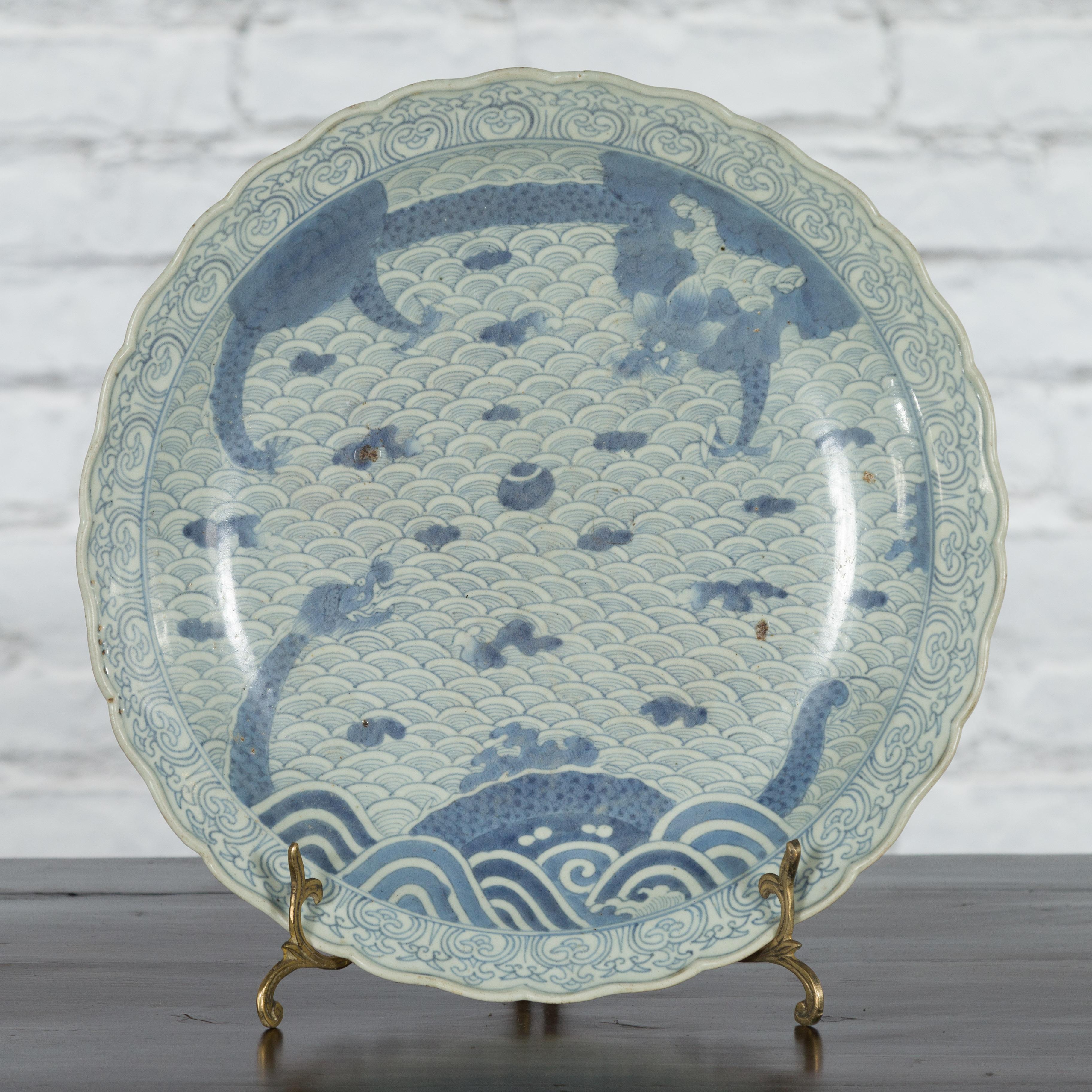 Japanese 19th Century Porcelain Plate with Blue and White Dragon in Clouds Décor In Good Condition In Yonkers, NY