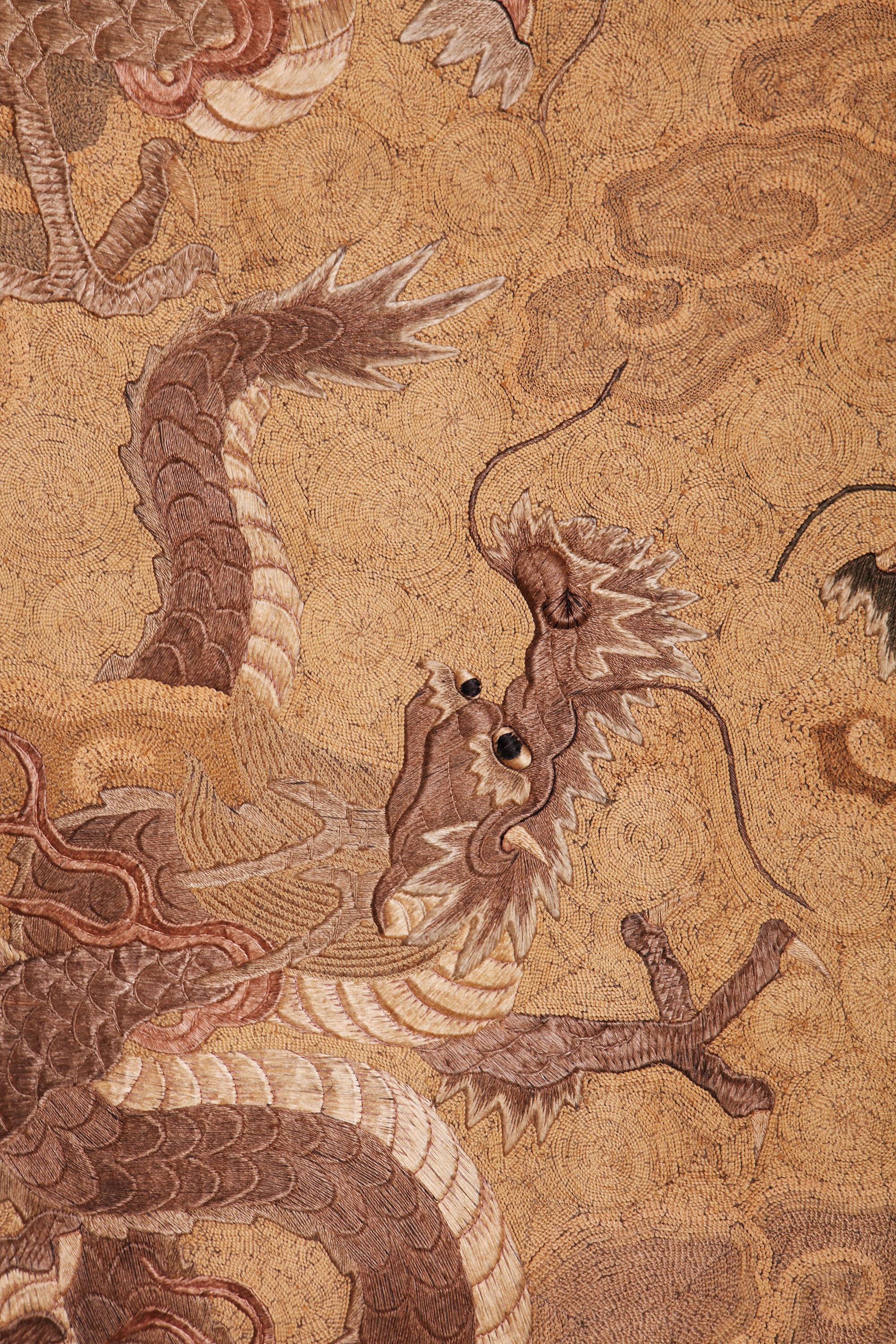 A fabulous large scale Japanese 19th Century Silk Needlework Panel of Three Dragons.