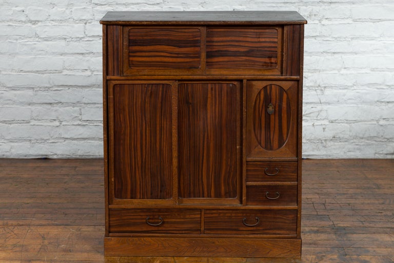 Japanese 19th Century Zebra Wood Cabinet with Sliding Doors, Panel and Drawers For Sale at 1stDibs