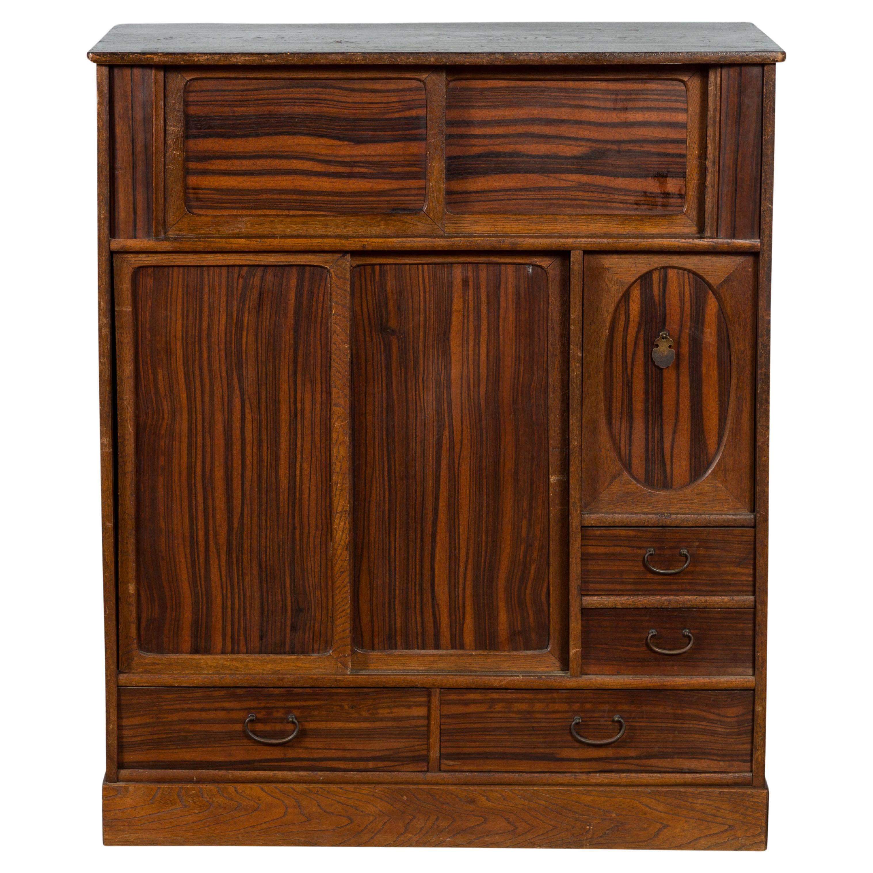 Japanese 19th Century Zebra Wood Cabinet with Sliding Doors, Panel and Drawers For Sale