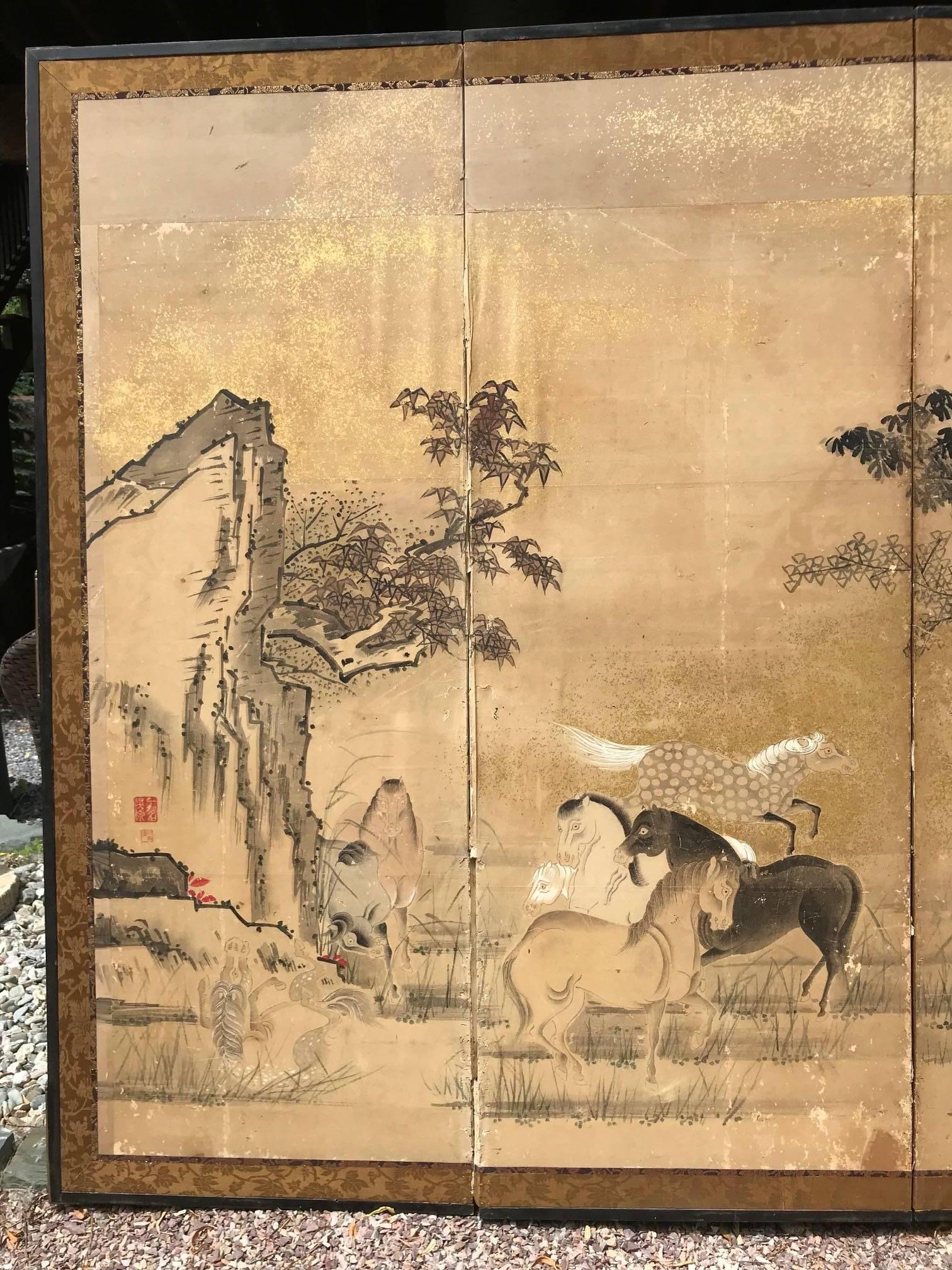 Japan, an early six-panel screen Byobu depicting 22 Horses frolicking among mountains and pines. This attractive screen dates to the Edo period, circa 1850.

Horses are a scarce motif for Japanese screens and we are pleased to have found this one