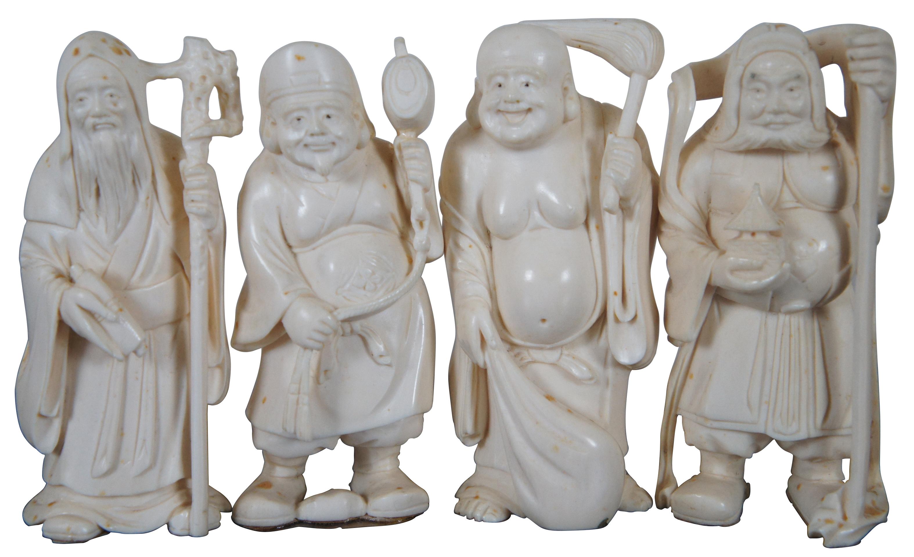 Vintage carved bovine set of Japan’s Seven Lucky Gods with an elegantly carved wood base. Measure: 18