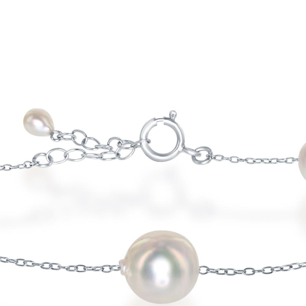 This cultured Japanese Akoya baroque pearl and sterling silver bracelet features pearls that range in size from 6.5mm up to 9mm. The bracelet is adjustable from 7 to 8 inches. 