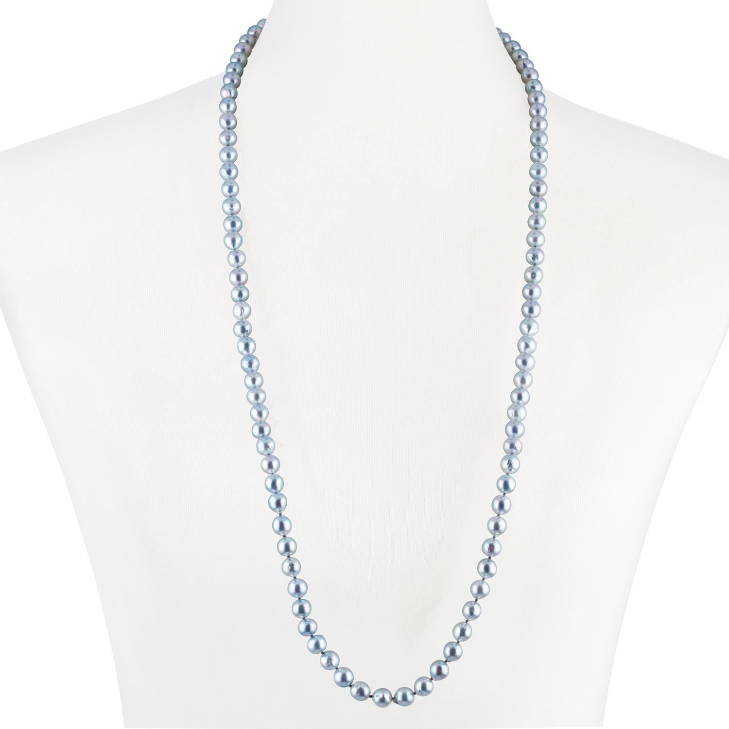 These Japanese Akoya natural blue color baroque cultured pearls measure 8-9mm. 
This double length necklace is strung with a 14k white gold 8mm ball clasp to 36