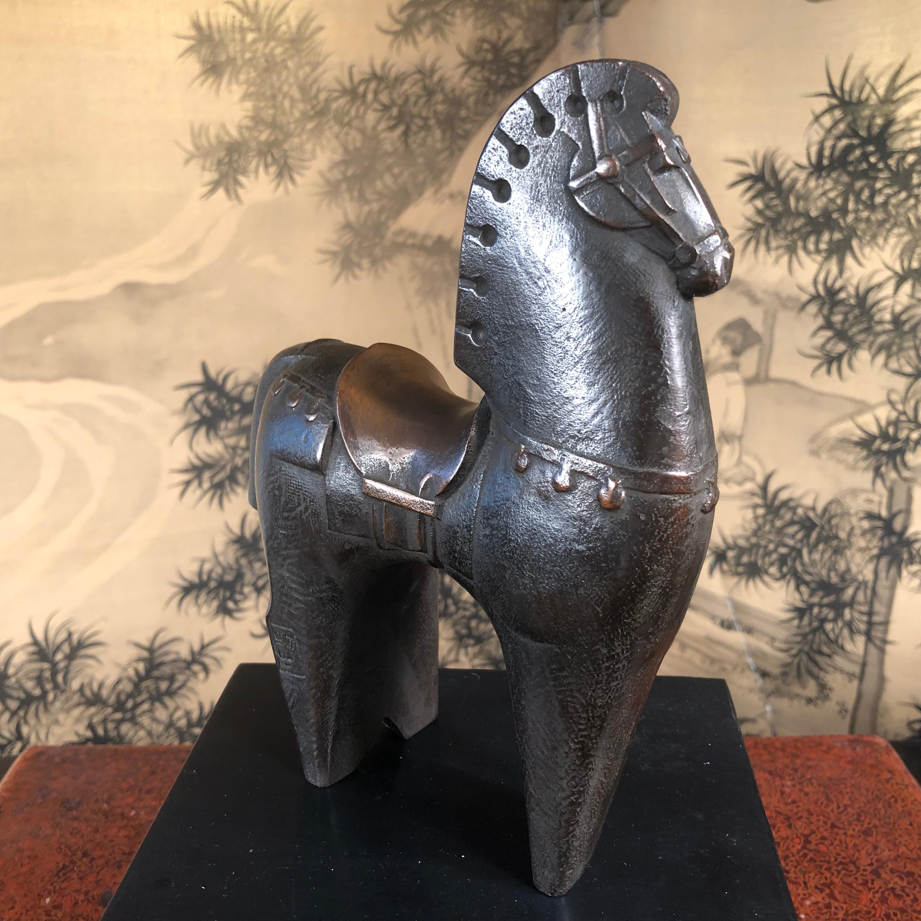 The first we have seen.

This enigmatic ancient-style Japanese horse- a master work caste in solid bronze reminds us of the ancient original clay horses such as Haniwa model horse from the Kofun period (593-710 AD).

Designed by the Japanese legend