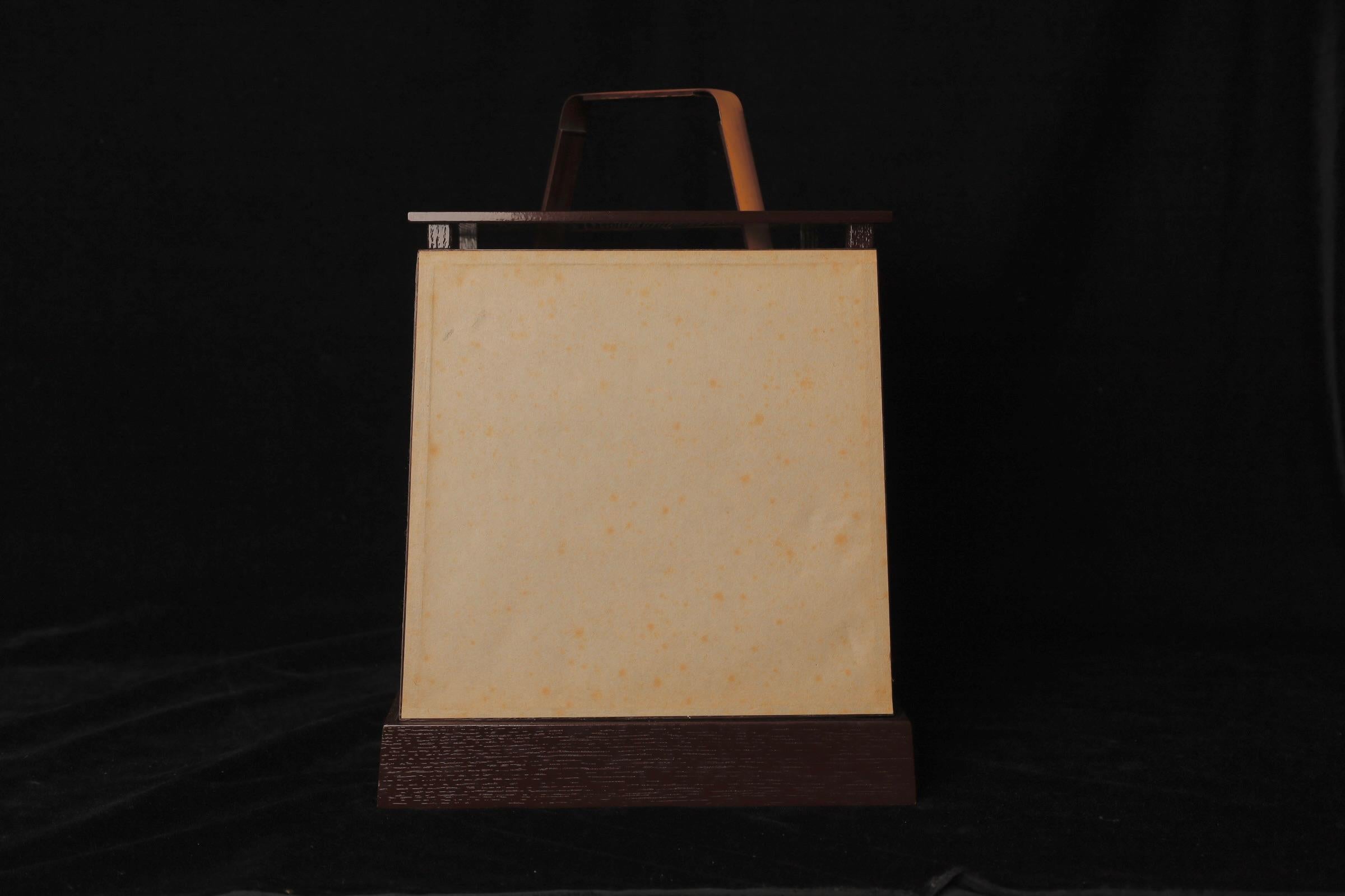Beautiful   Japanese  Andon lantern for tea ceremony . Wood frame with Awashi handmade paper and bamboo handle. A beautiful addition to any room! It can be used with simple candle and all create very soft light and unique environment. 
Size :  27cm