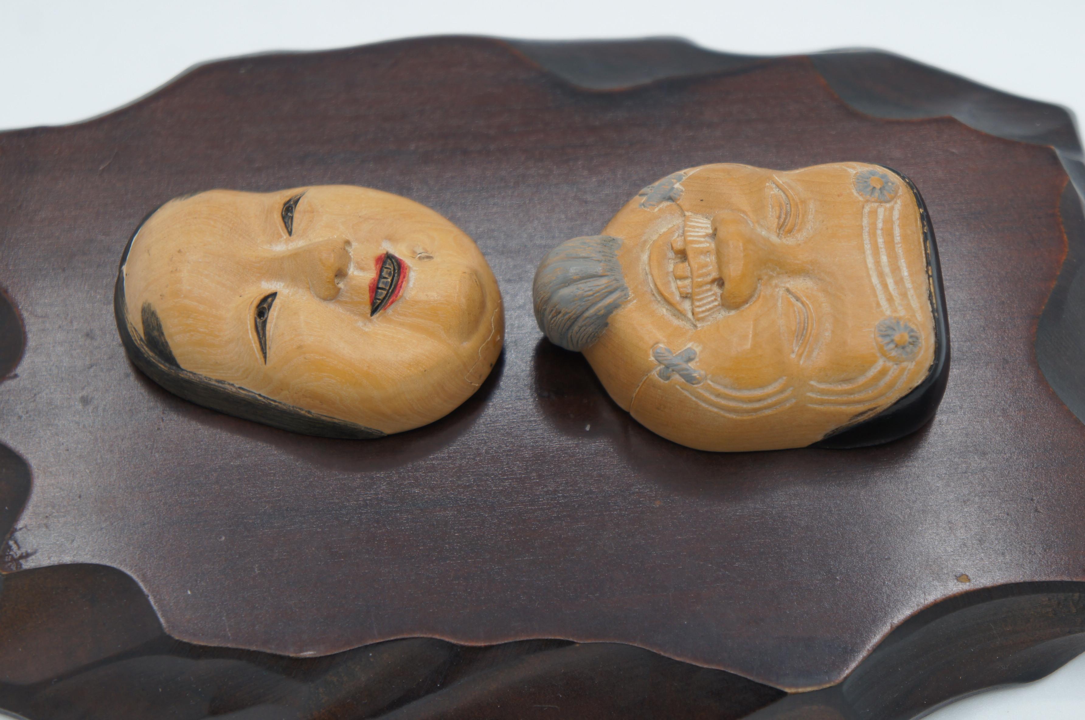 Japanese Antique 2 Wooden Netsuke Charms Okinamen and Onnamen  In Fair Condition For Sale In Paris, FR