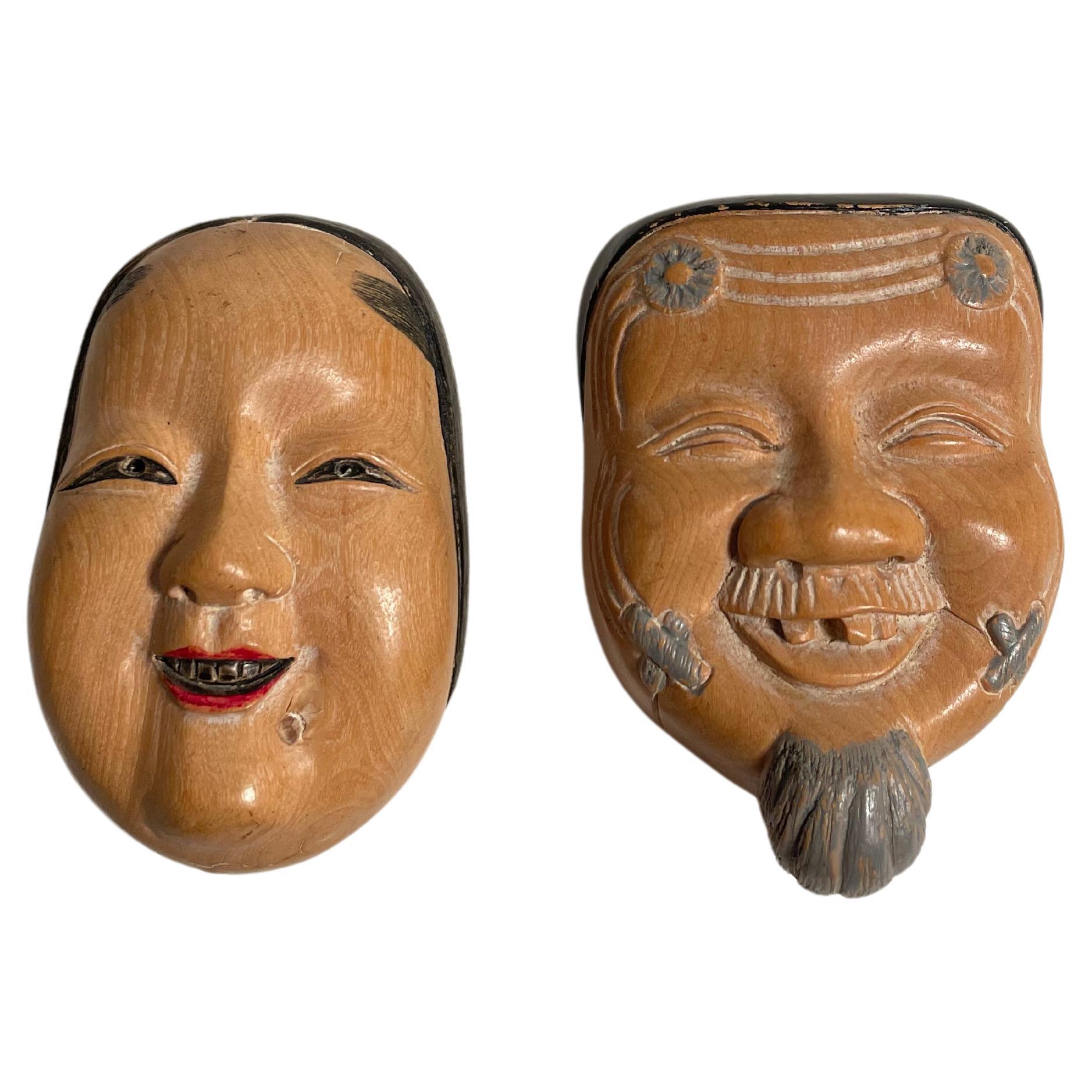 Japanese Antique 2 Wooden Netsuke Charms Okinamen and Onnamen  For Sale