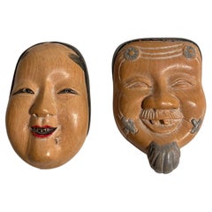 Japanische antike 2 japanische Netsuke-Charm-Okinamen und Onnamen aus Holz 