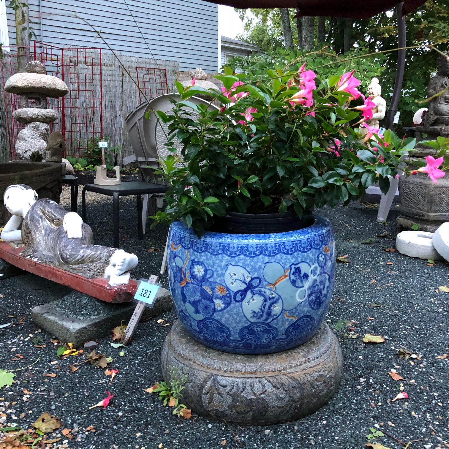 Glistening antique blue glazed ceramic form planter or bowl, formerly a hibachi from old Japan dating 1890-1900. 

A rare find this large.

Auspicious symbols are revealed in under glaze cream and blue colors. 

Fine quality. Lovely old