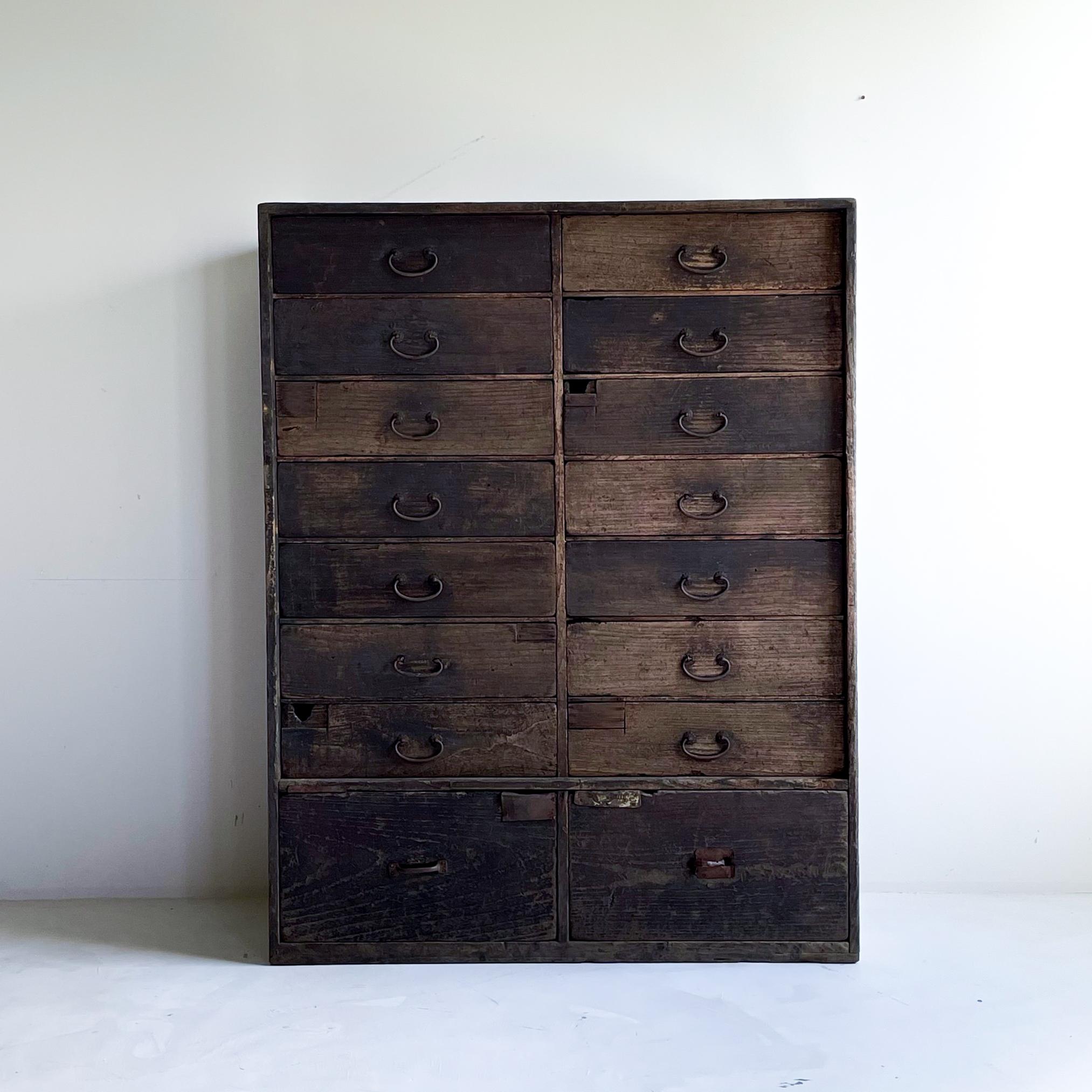 Very old Japanese drawer storage.
The furniture dates from the Meiji period (1860s-1900s).
It is made of paulownia wood.
The metal fittings on the handles are made of iron.

The design is uniquely Japanese, rustic and lean.
It is the ultimate in