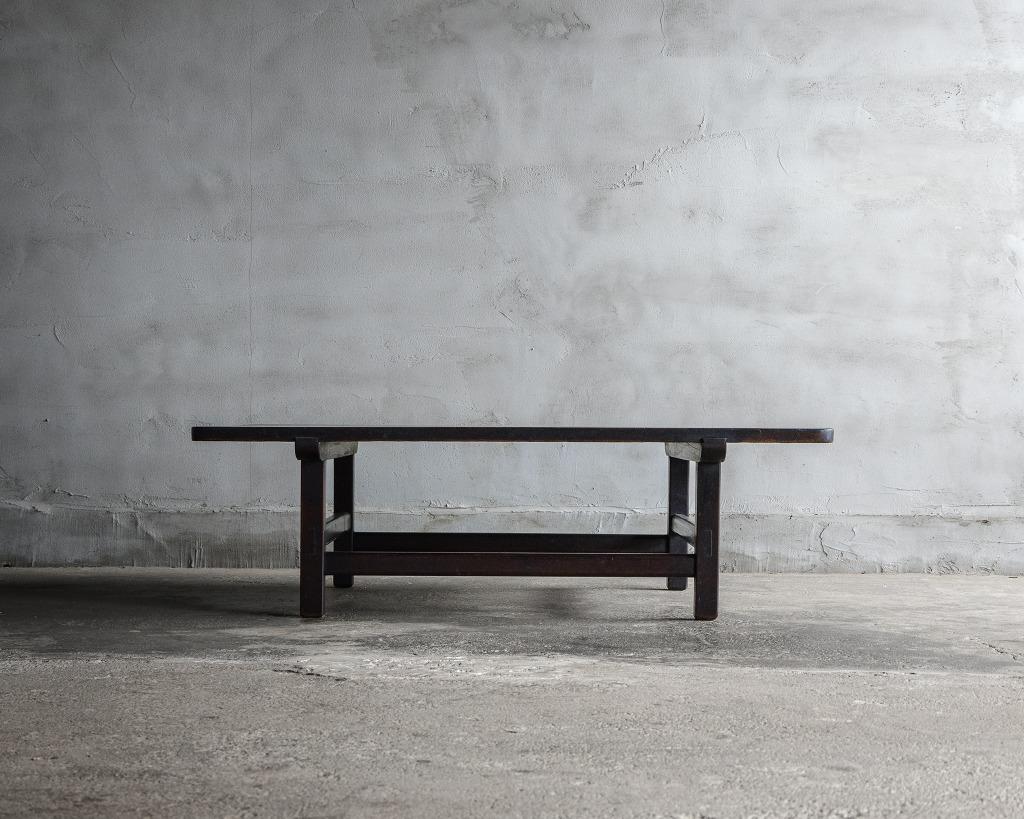 This is a Japanese antique black low table.
It was made in the Meiji Era(1868-1912).

This Japanese-made antique low table is simple yet beautifully crafted. The attractive deep brown color, close to black, is ideal as a coffee table or center table