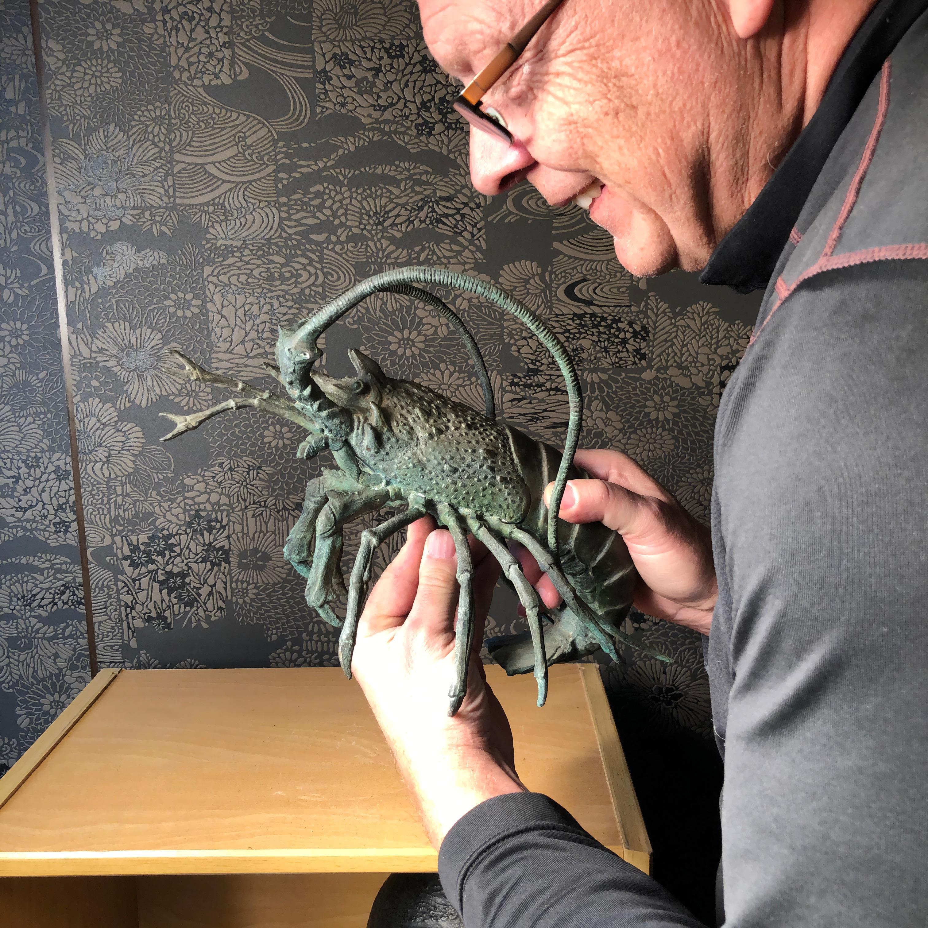 From our recent Japanese acquisitions travels comes this impressive oversized crustacean.

A fine bronze jumbo sculpture okimono of an animated lobster dating to the early 20th century, Taisho period.

Brilliantly conceived with original dark