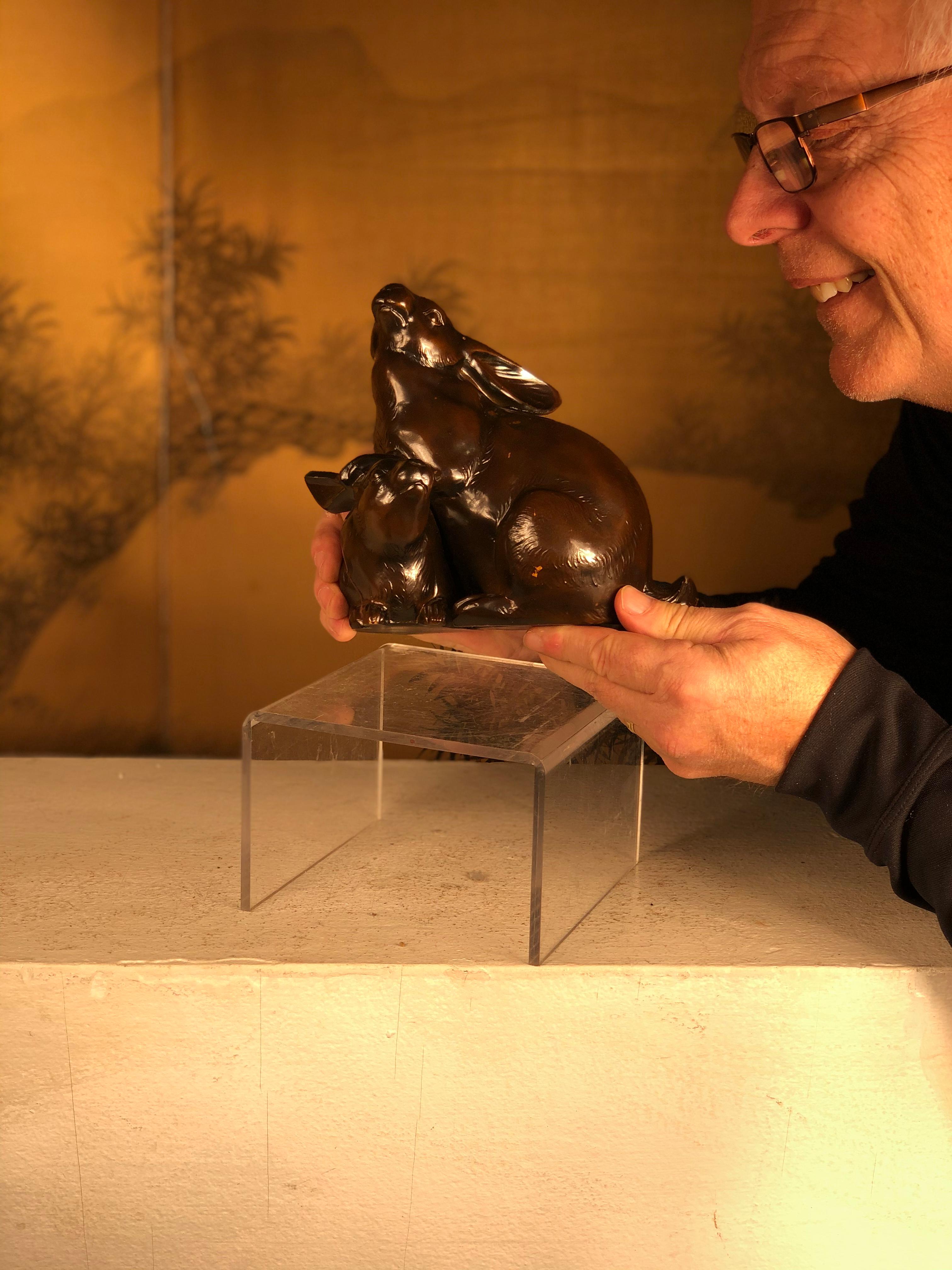 From our recent Japanese acquisition travels and coming from an important Japanese collector of rabbit usagi sculptures

A one-of-a-kind bronze rabbit family group with fine details, a mother and baby rabbit. .

Signed. 

This is a remarkable