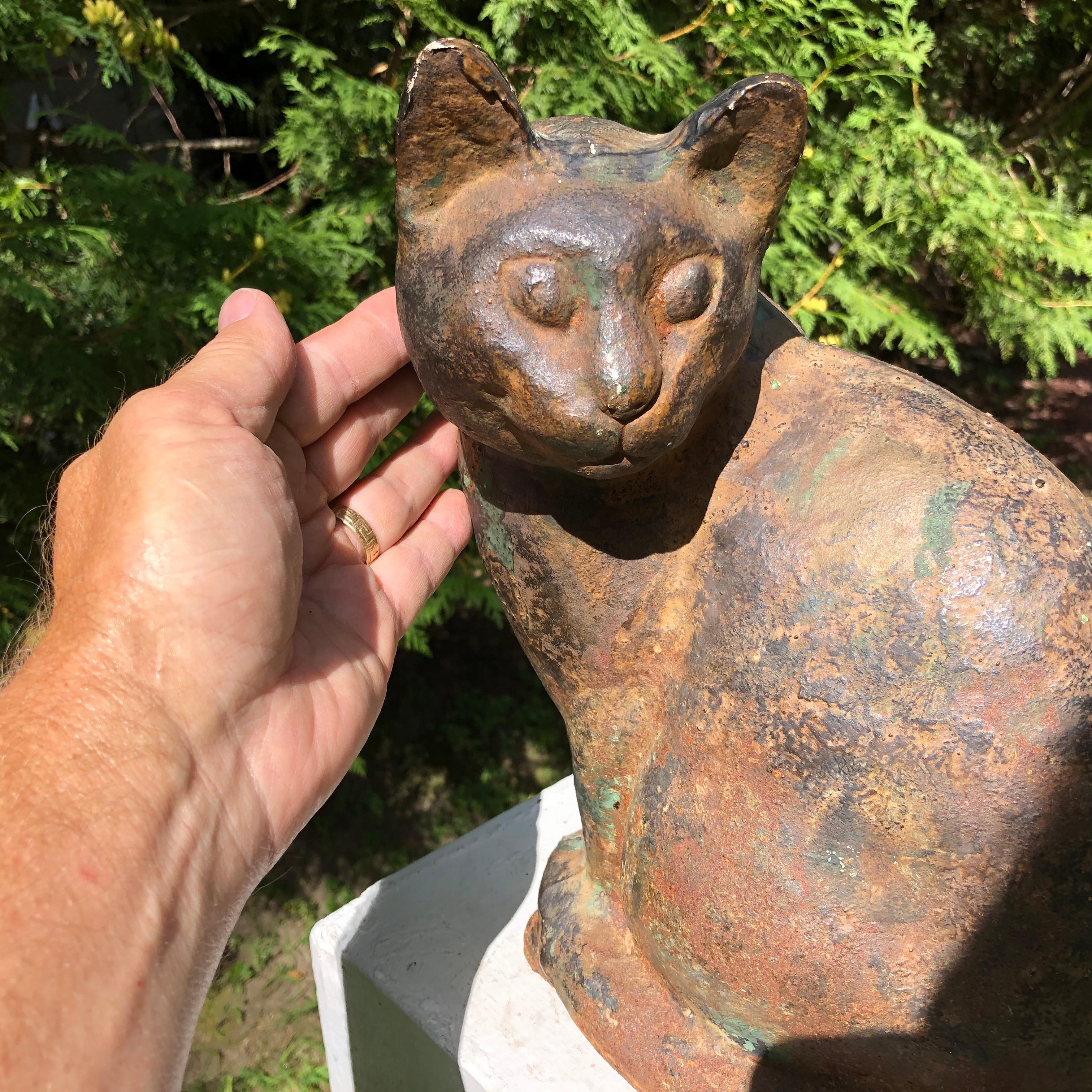 From Our Recent Japanese Acquisitions Travels.

A charming Japanese antique cat hand cast and crafted in sturdy iron.

Attractive pose and even more attractive face.

Dimensions: 12.5 inches high and 10 inches wide

Only one.

We have been