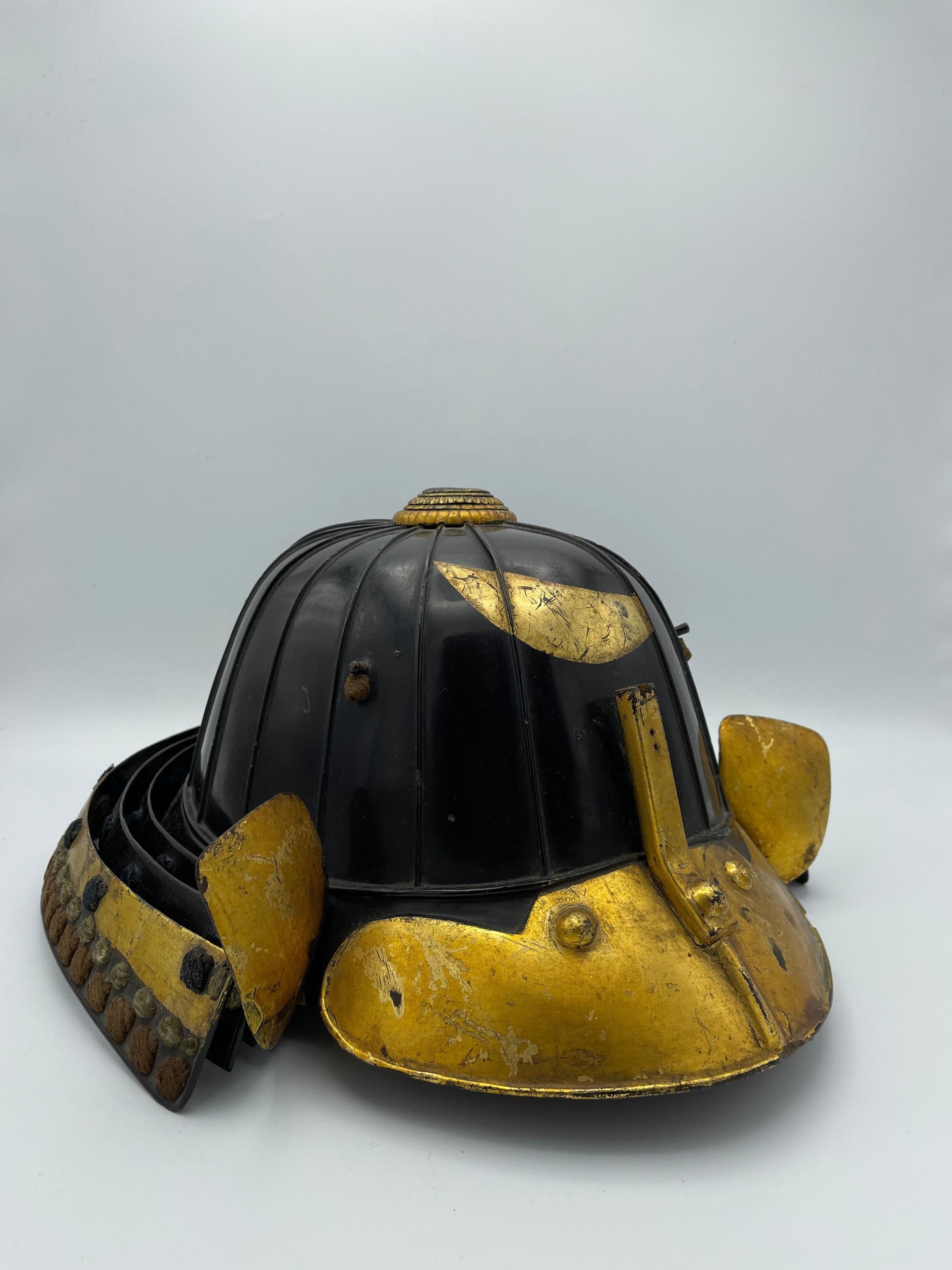 This is an antique combat helmet made around 1800s in Edo era in Japan.

Kabuto is a type of helmet first used by ancient Japanese warriors which, in later periods, became an important part of the traditional Japanese armour worn by the samurai