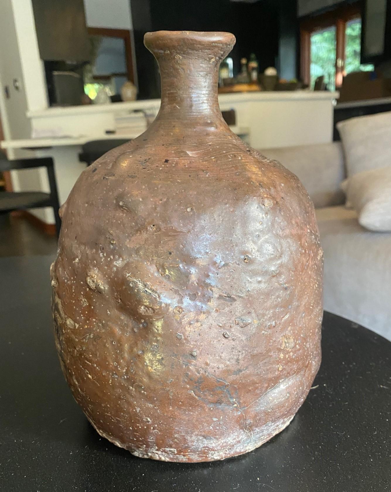 A beautifully shaped, glazed (a lava crater glaze reminiscent of such modern western potters as Beatrice Wood, Glenn Lukens and Otto and Gertrud Natzler), and complexly textured Tamba (Tanba) ware Japanese pottery vase/jar/pot - produced sometime