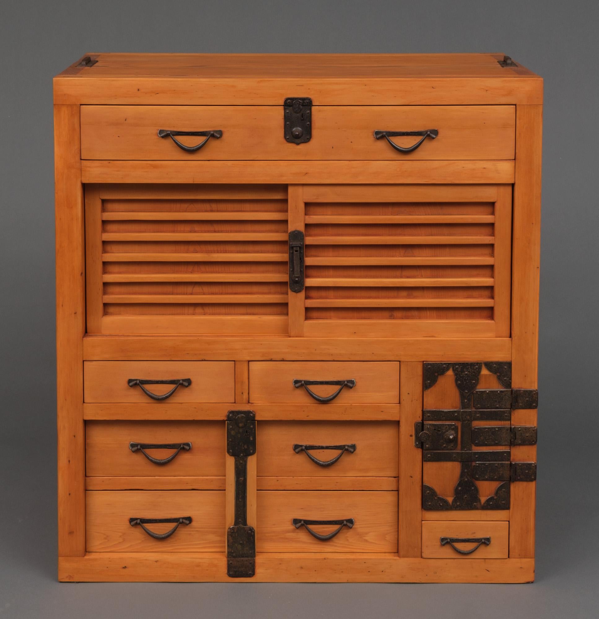 Amazing wooden Gifu chôba’dansu (merchant's document cabinet) with sturdy iron hardware and a well-hidden secret compartment. Fully restored, cleaned and waxed.

Made of indigenous sugi (cedar) and hinoki (cypress) wood varnished in a sought after